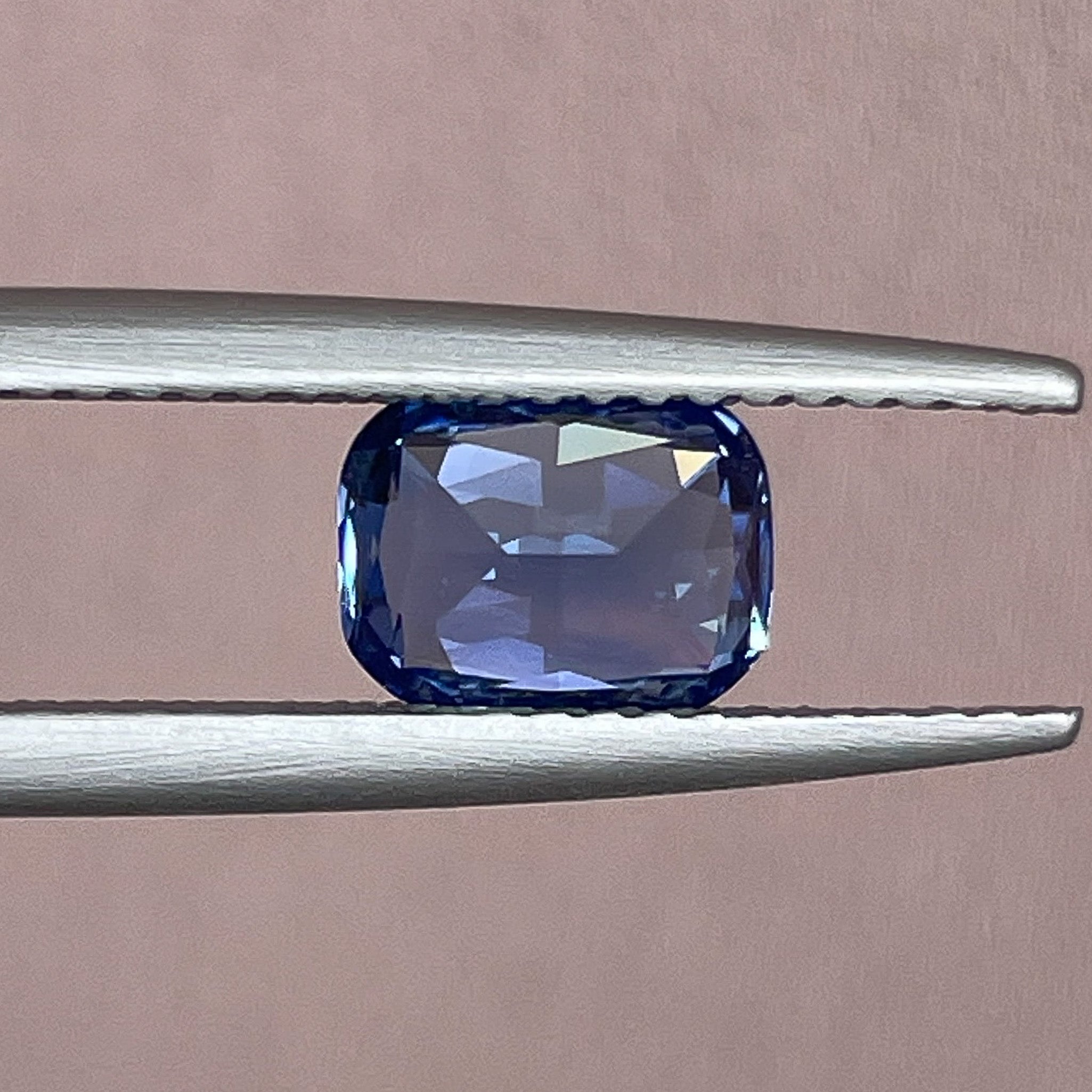 Natural Ceylon blue sapphire 1.60 Ct cushion cut loose gemstone by NASHGEMS, vivid blue, ideal for engagement rings or custom jewelry.