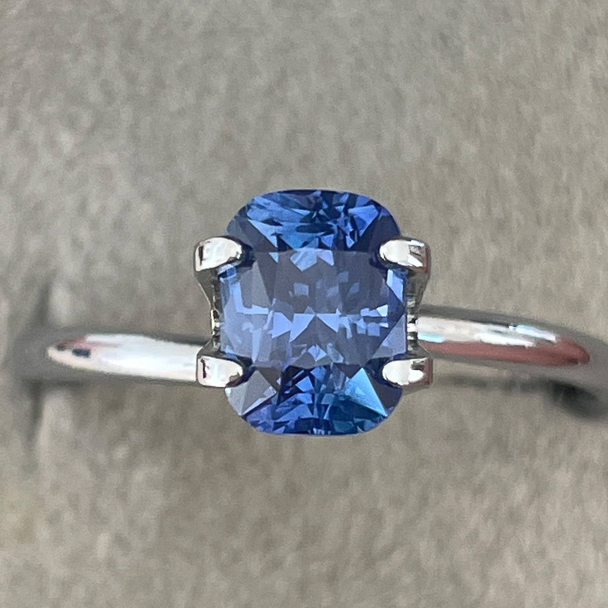 Natural Ceylon Blue Sapphire 1.60 Ct cushion cut loose gemstone from NASHGEMS, vivid blue for engagement or custom jewelry.