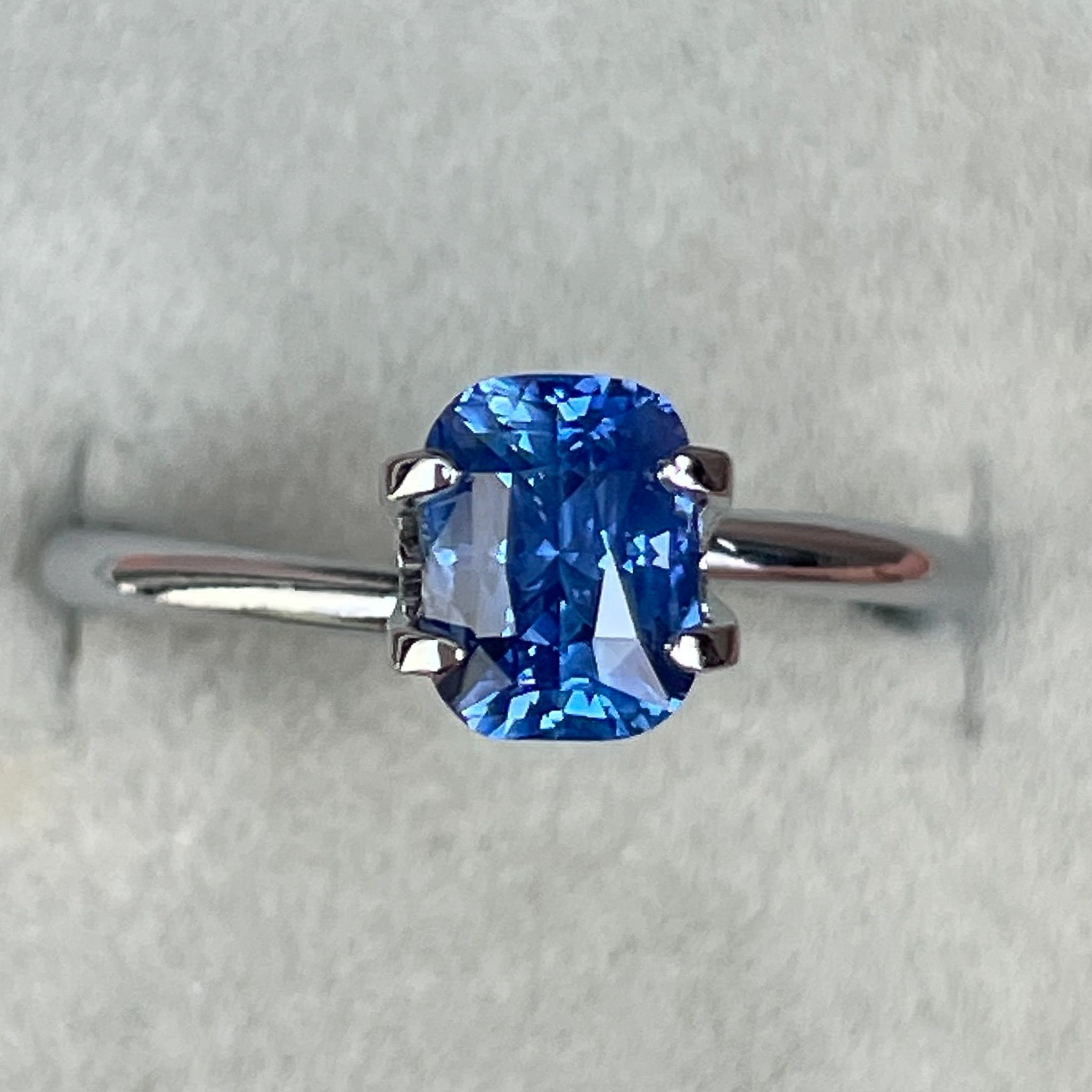 Natural Ceylon blue sapphire 1.60 Ct cushion cut, vivid blue loose gemstone ideal for engagement rings or custom jewelry.