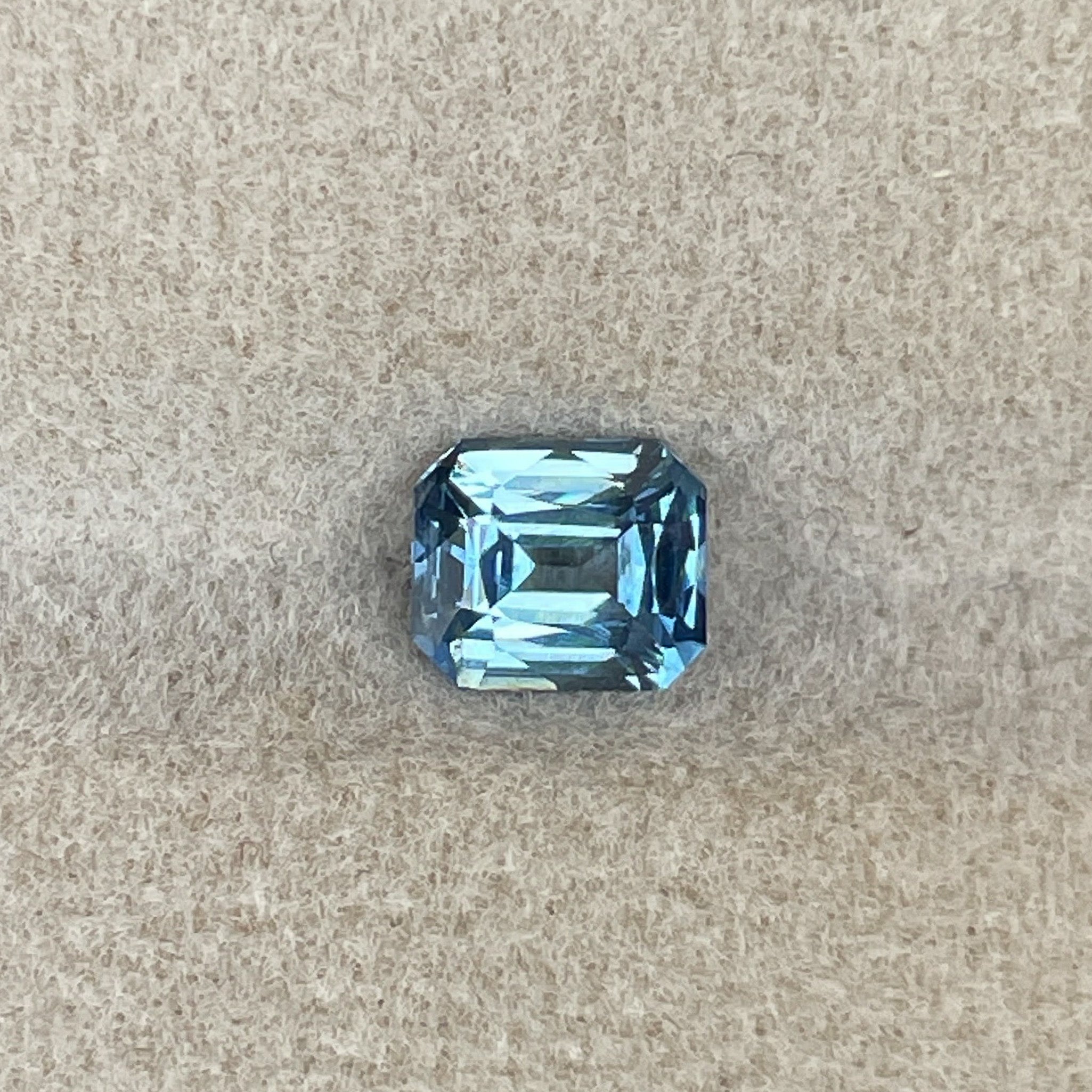 Natural pale blue sapphire 1.08 Ct teal emerald cut loose gemstone for engagement or custom jewelry by NASHGEMS.