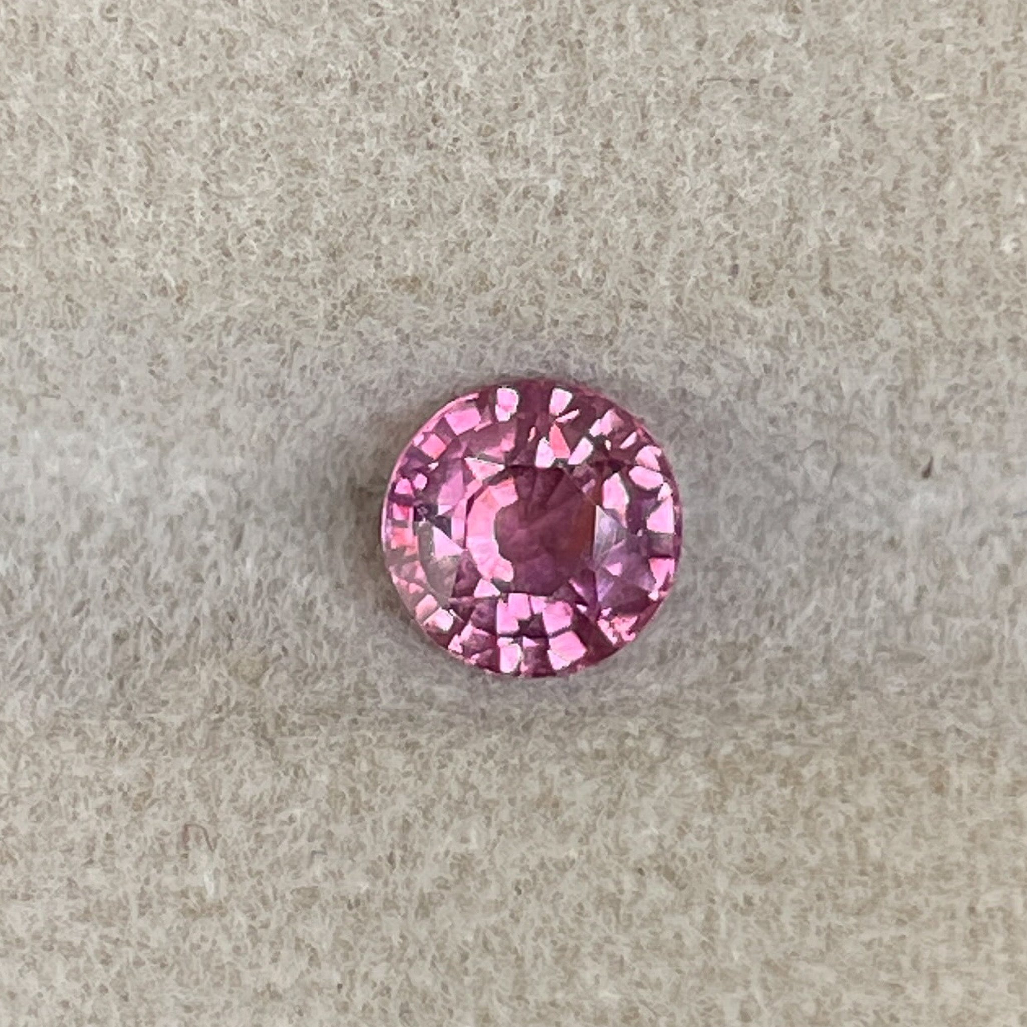 Natural pink sapphire 0.91 ct round cut loose gemstone by NASHGEMS, VVS clarity, no heat treatment, ideal for engagement rings.