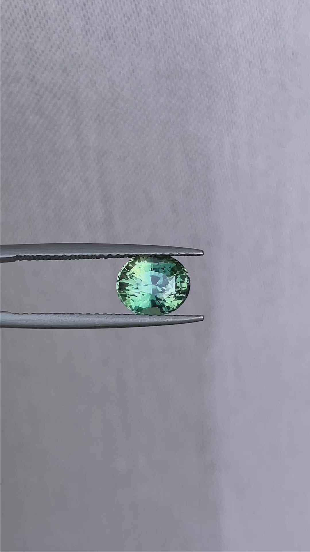 teal blue green parti sapphire oval cut gem