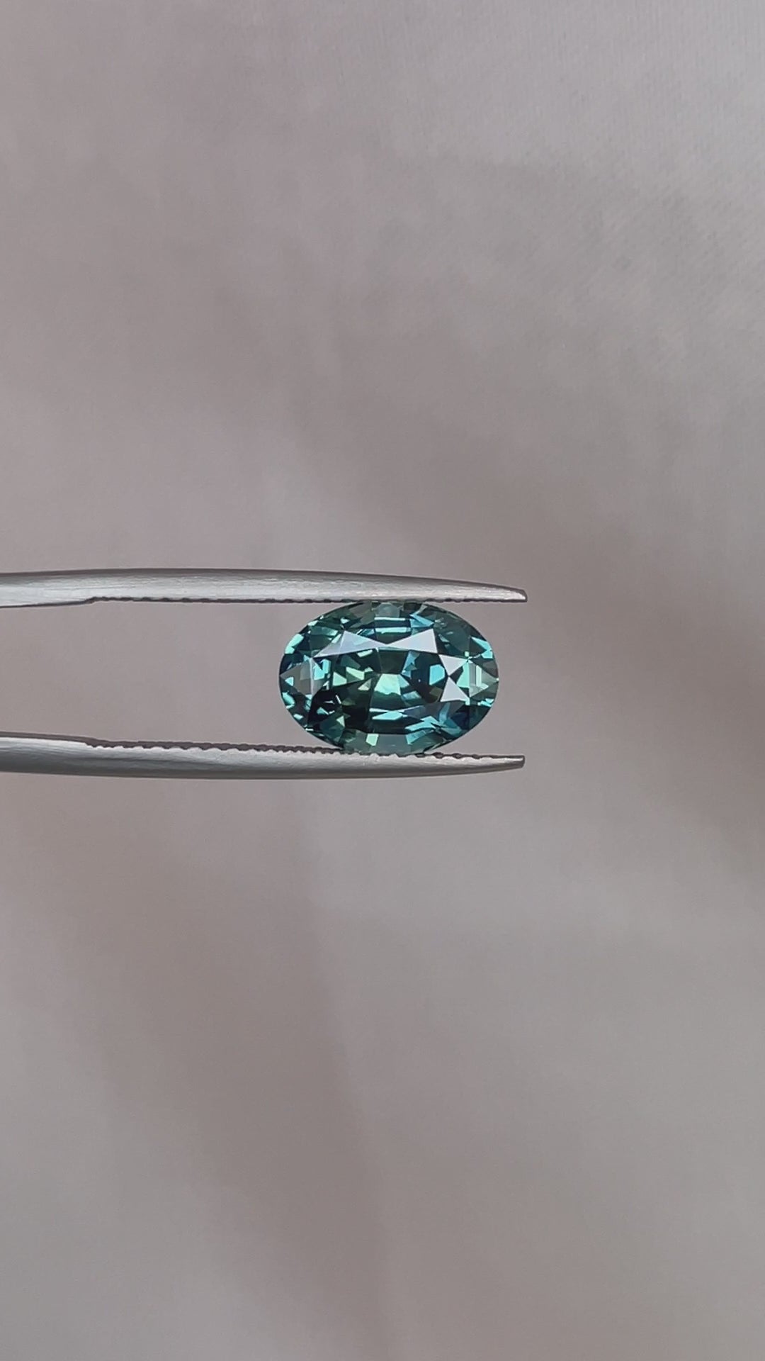 teal blue green parti sapphire oval cut gem