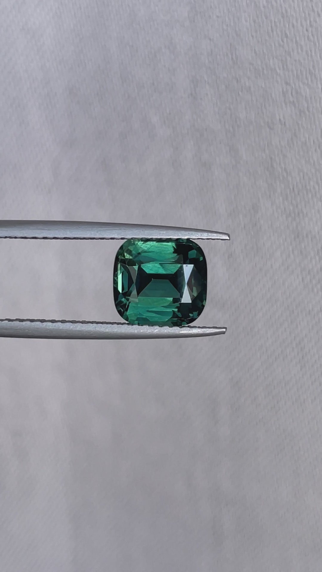 teal blue green parti sapphire cushion cut gem