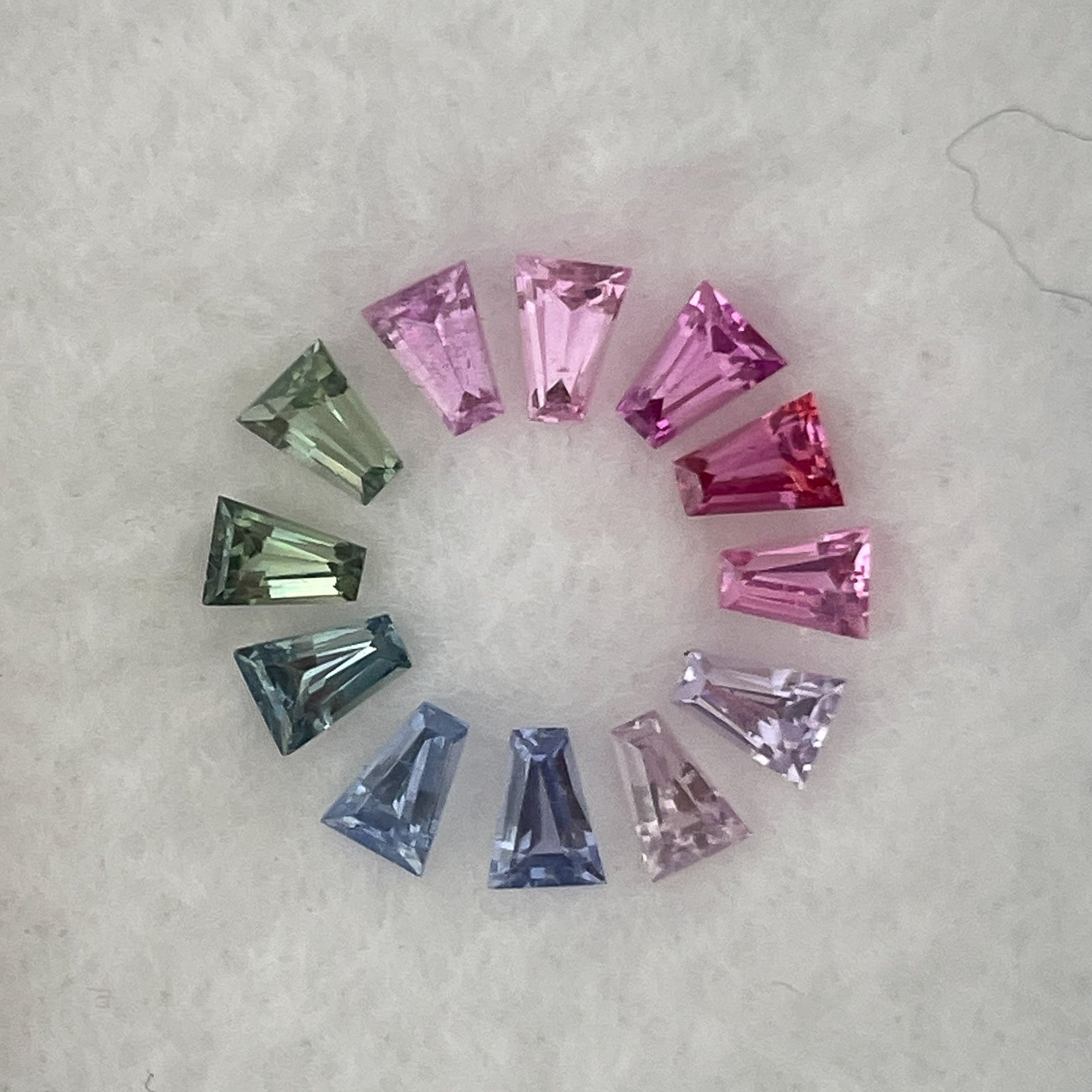 Natural rainbow sapphire lot with 1.37 carats of multi-colored loose sapphires for custom jewelry from NASHGEMS.