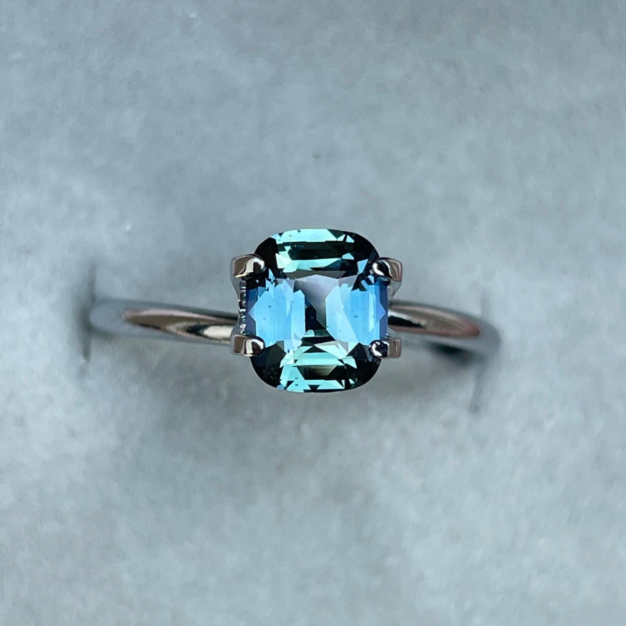 teal blue green parti sapphire cushion cut gem