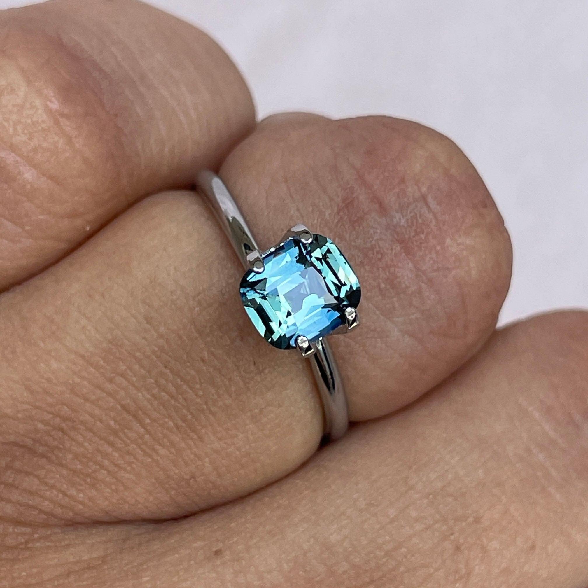 teal blue green parti sapphire cushion cut gem