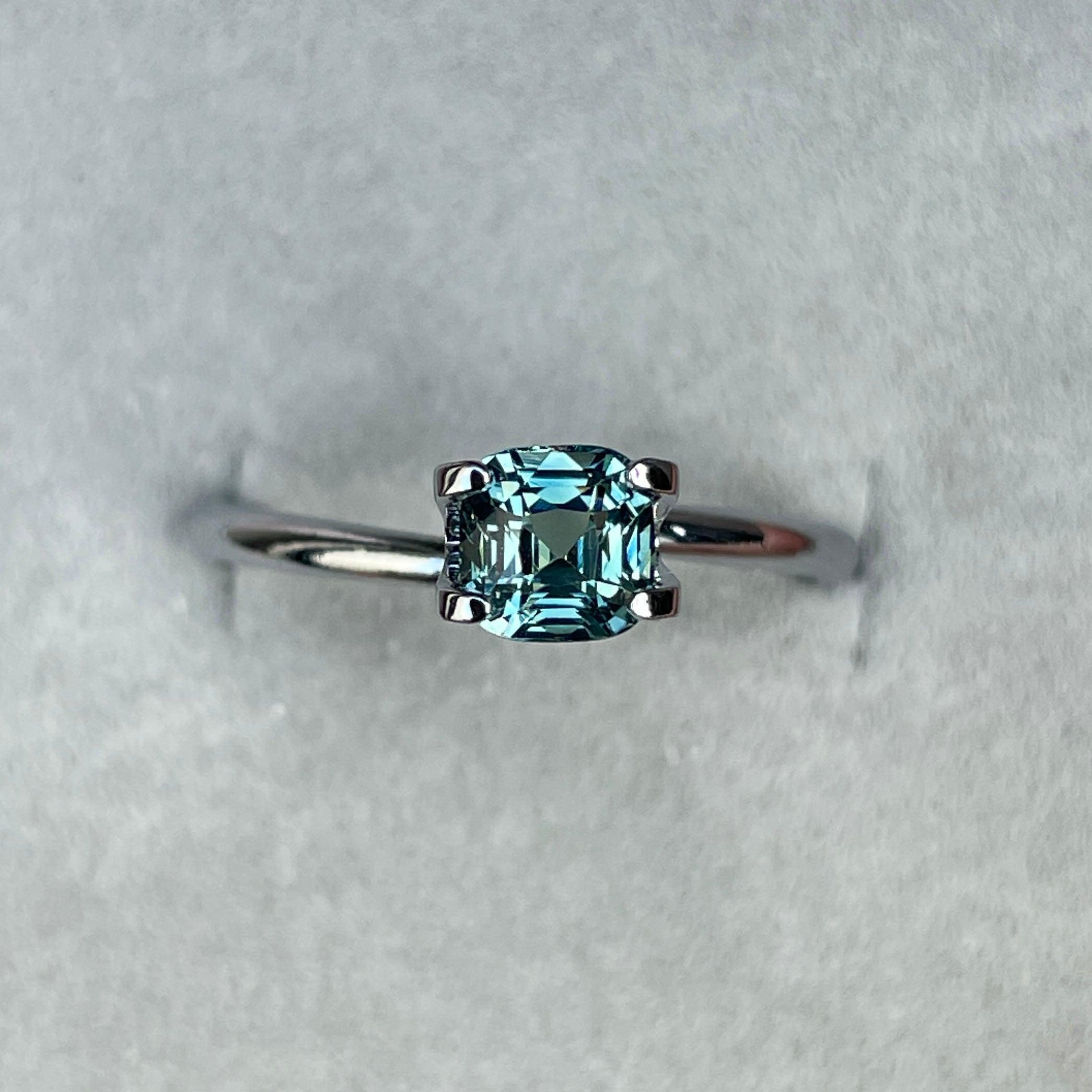 teal blue green parti sapphire cushion cut gem