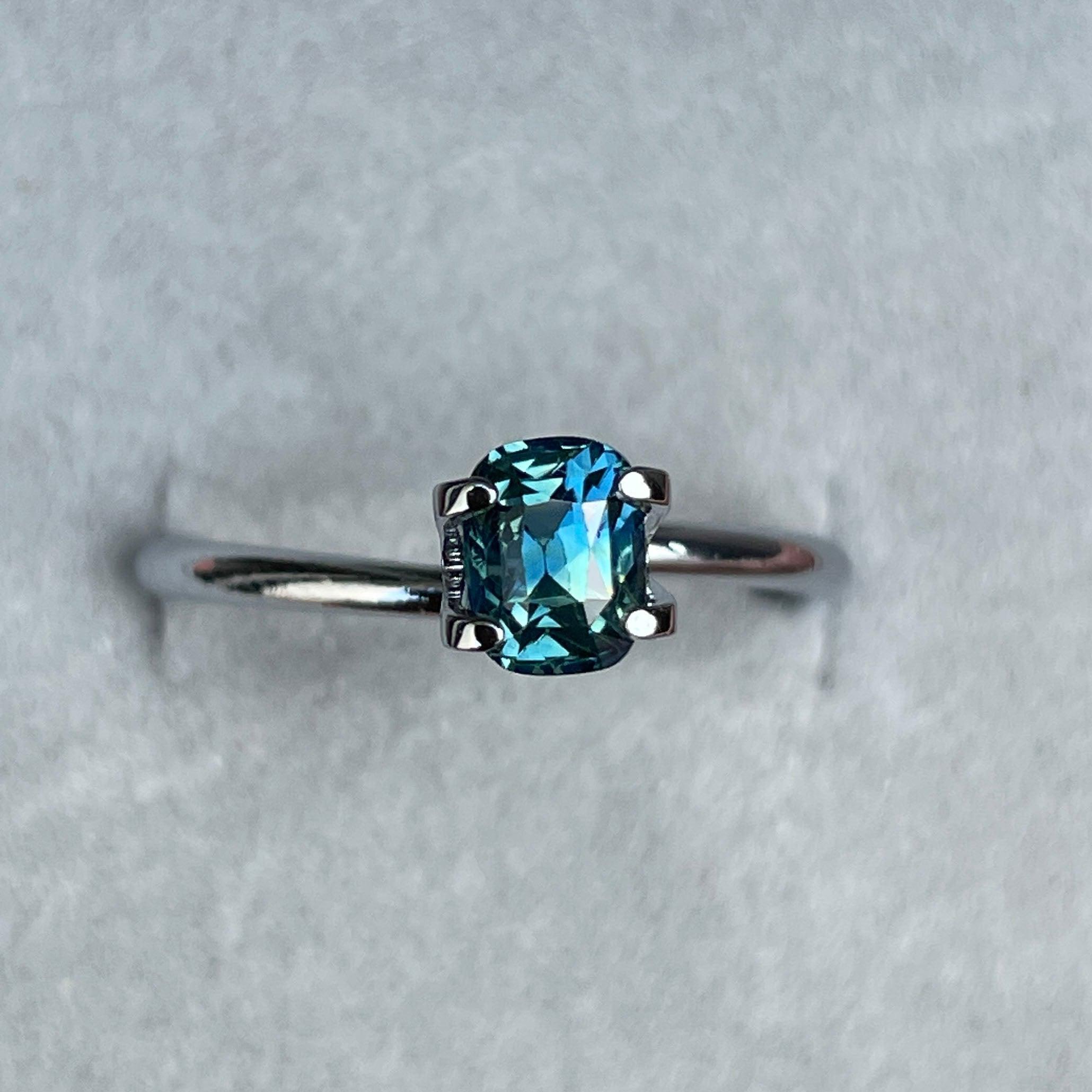 teal blue green parti sapphire cushion cut gem
