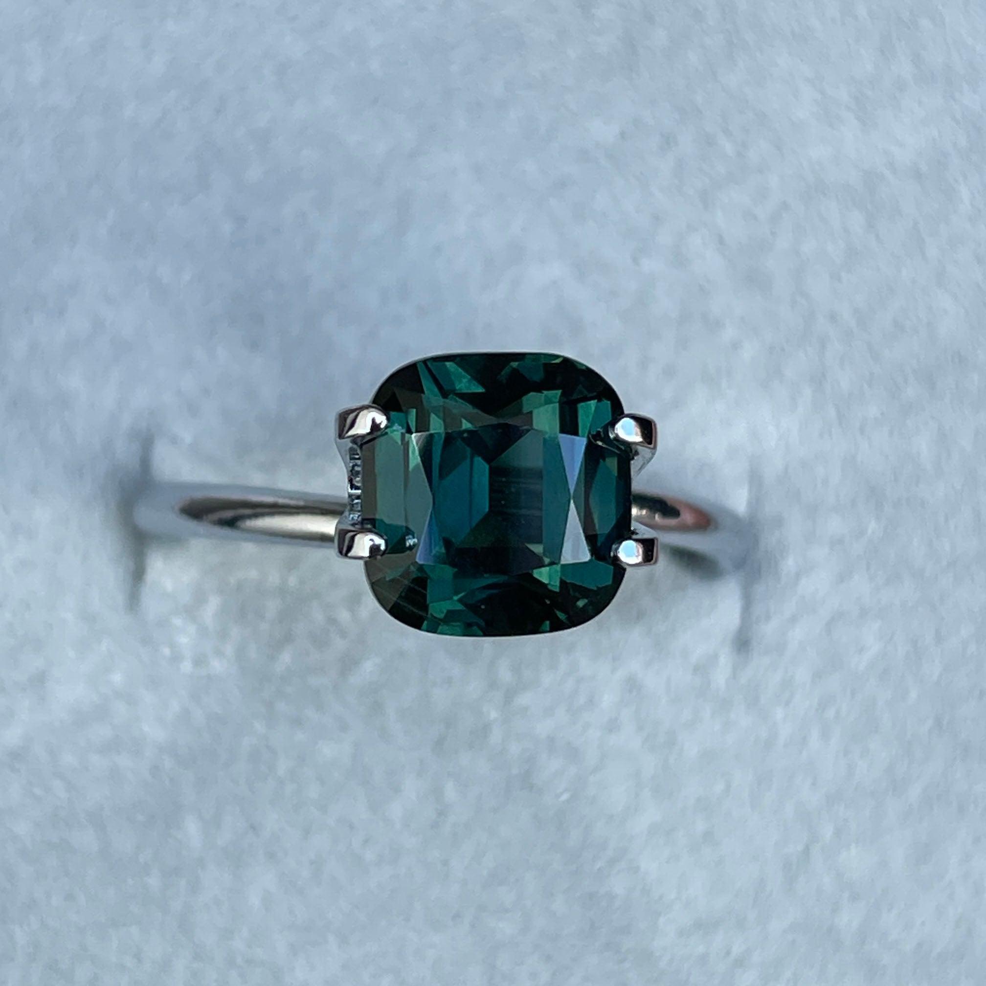 teal blue green parti sapphire cushion cut gem