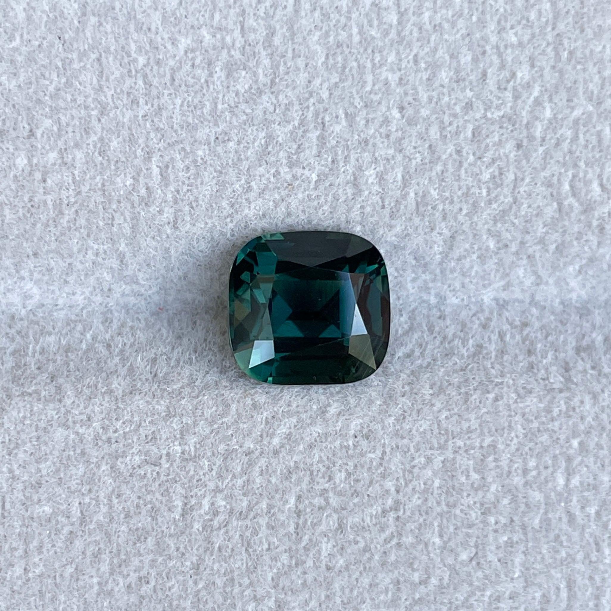 teal blue green parti sapphire cushion cut gem
