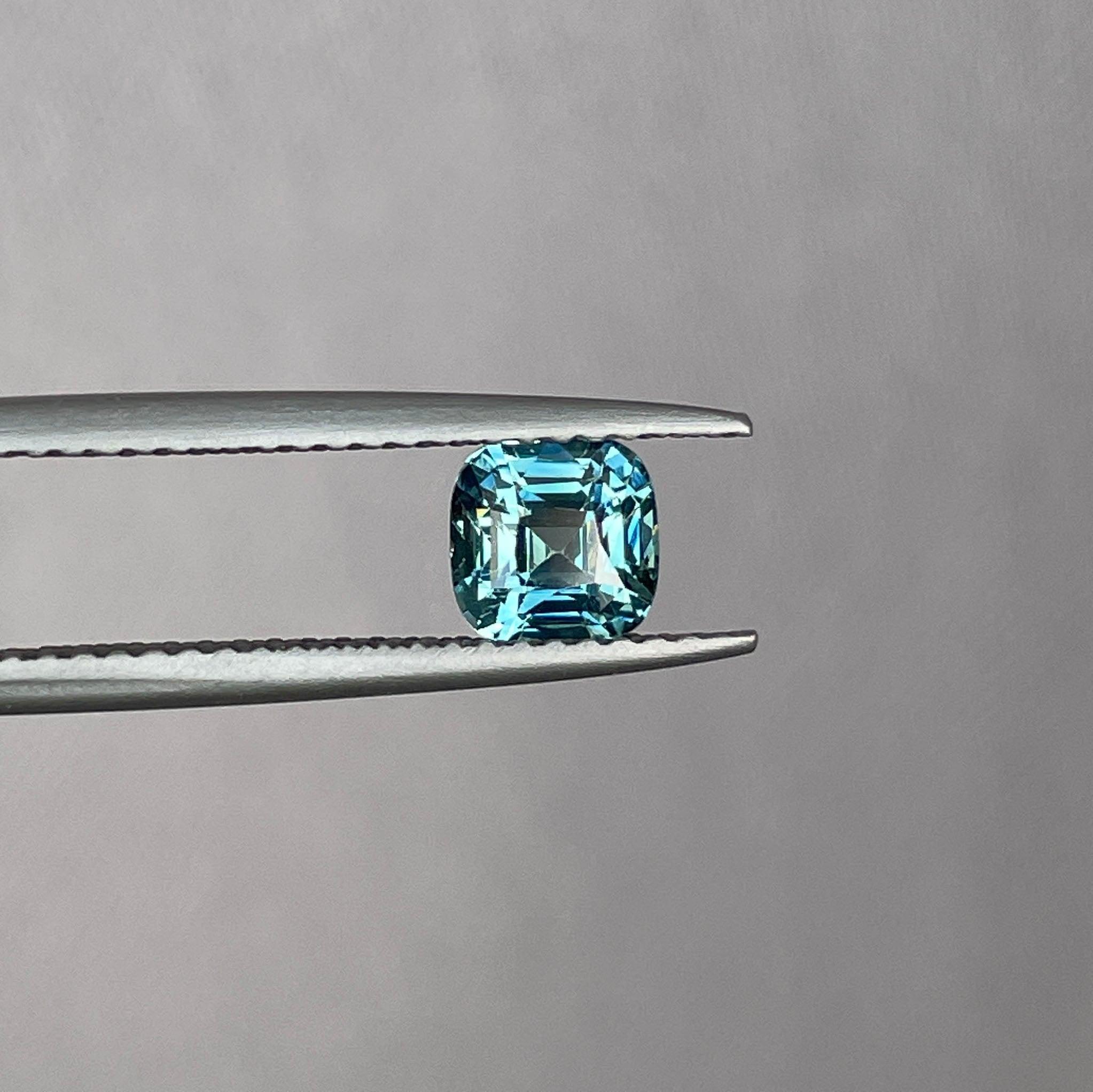 teal blue green parti sapphire cushion cut gem