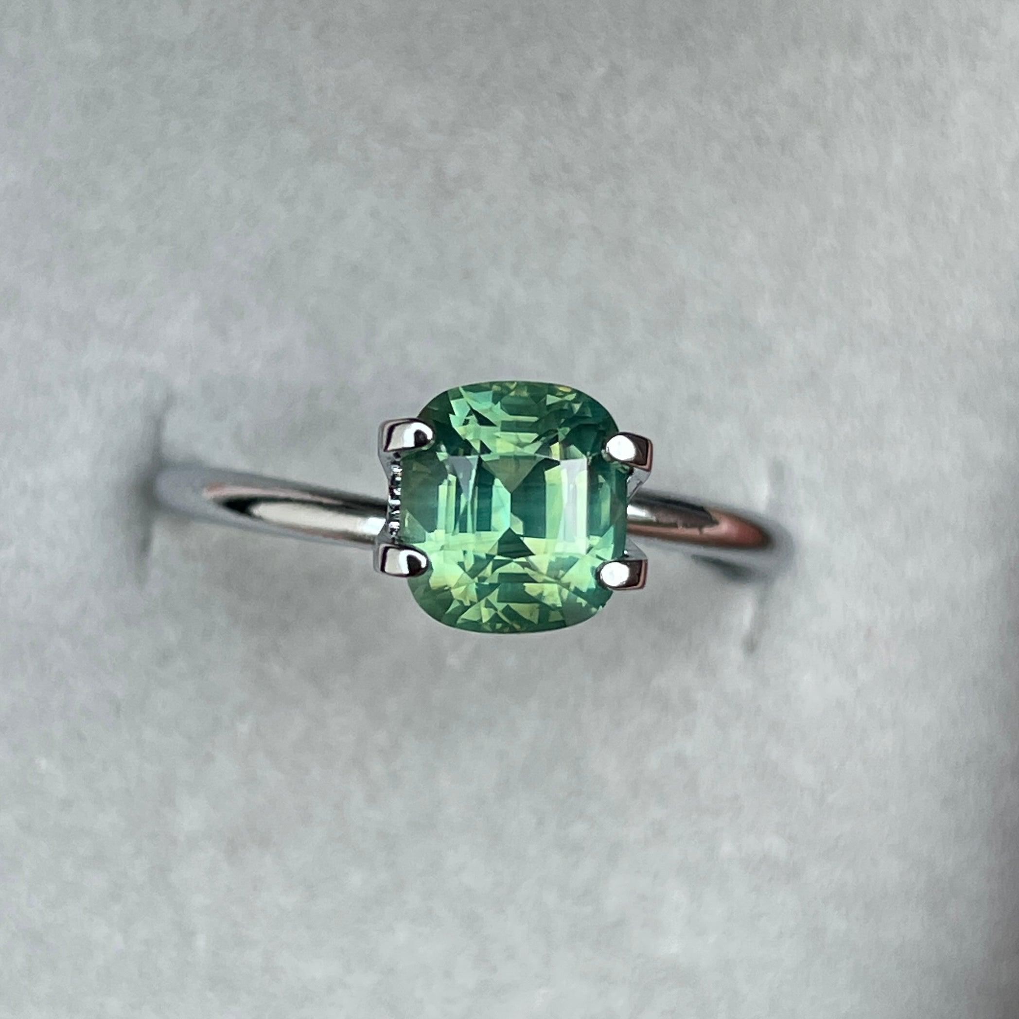 teal blue green parti sapphire cushion cut gem