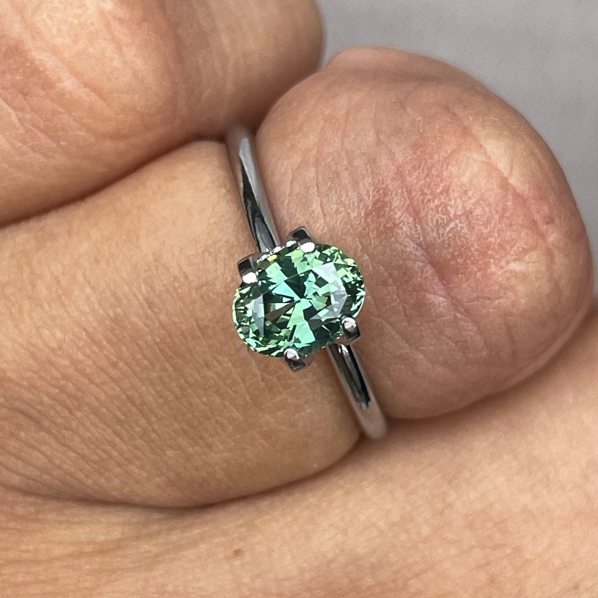 teal blue green parti sapphire oval cut gem