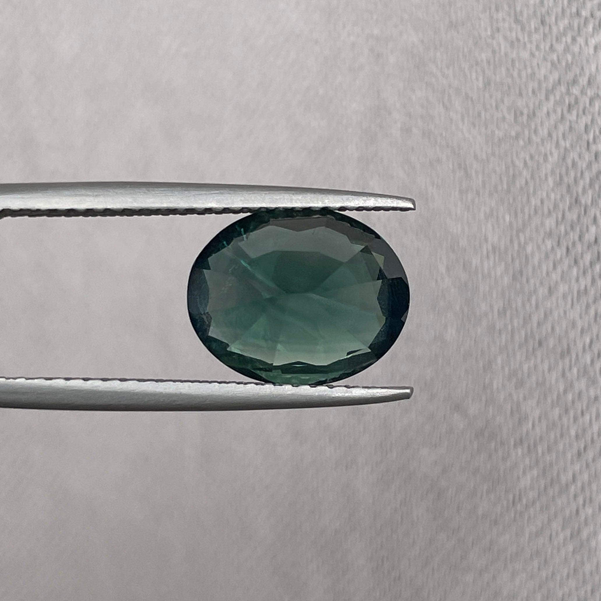 teal blue green parti sapphire oval cut gem