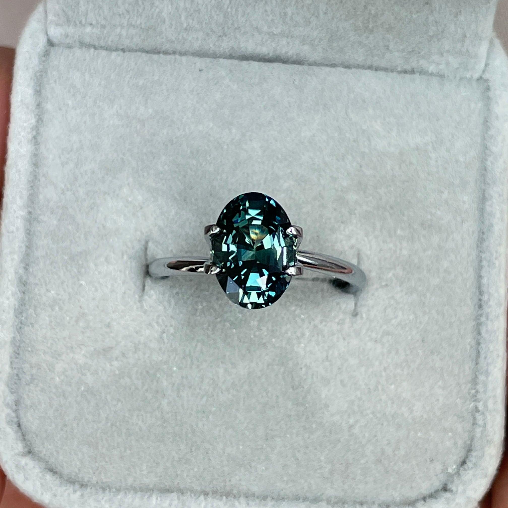 teal blue green parti sapphire oval cut gem