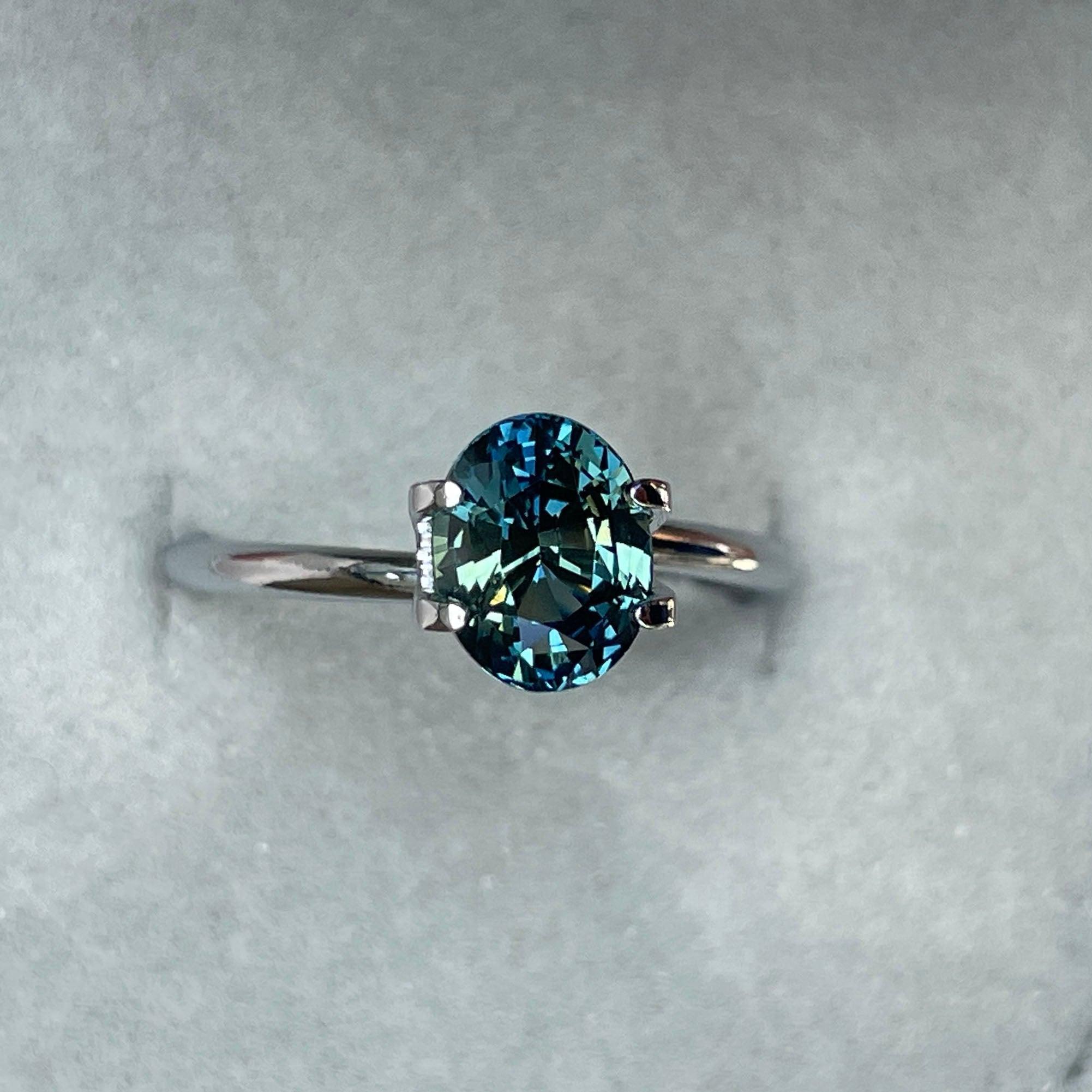teal blue green parti sapphire oval cut gem