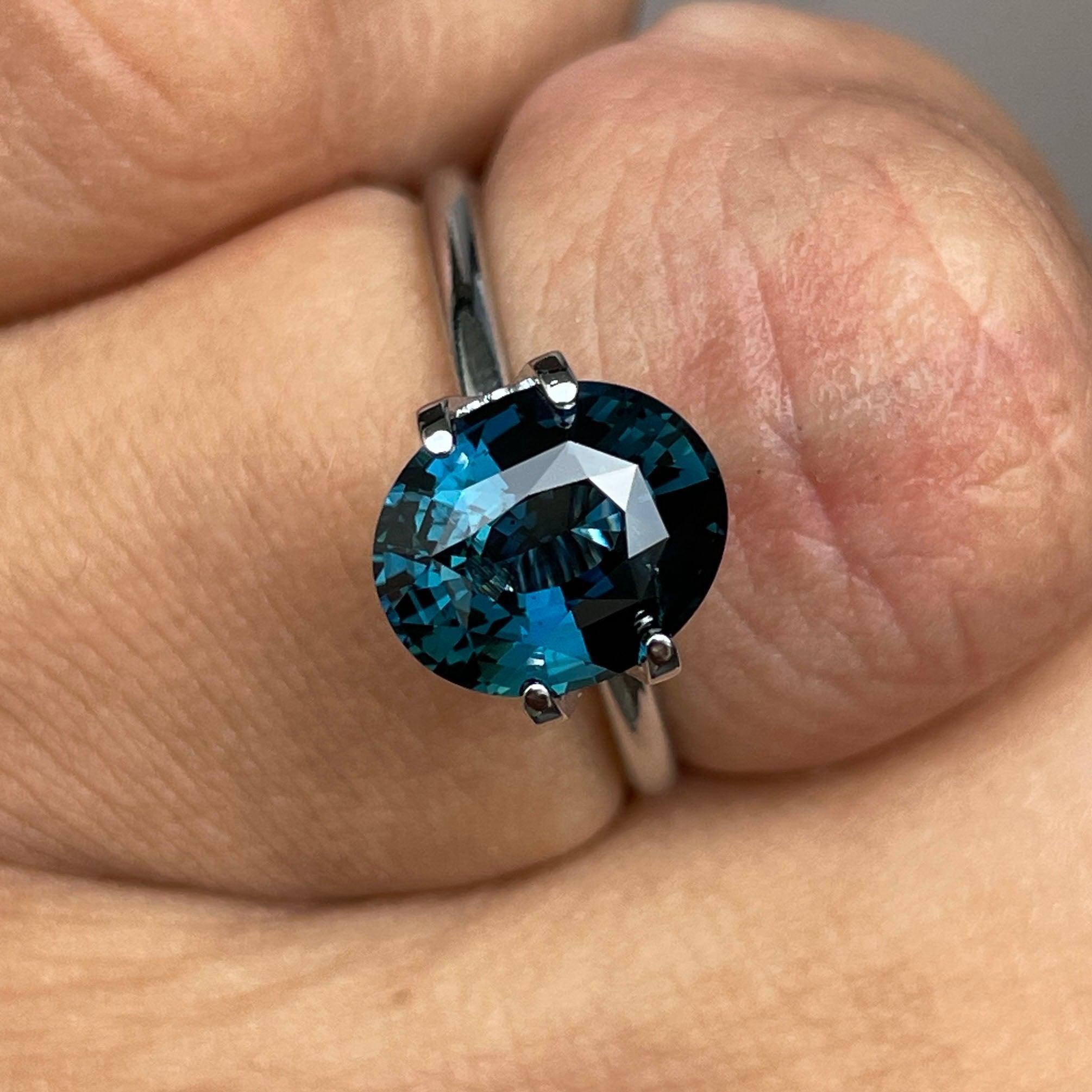 teal blue green parti sapphire oval cut gem