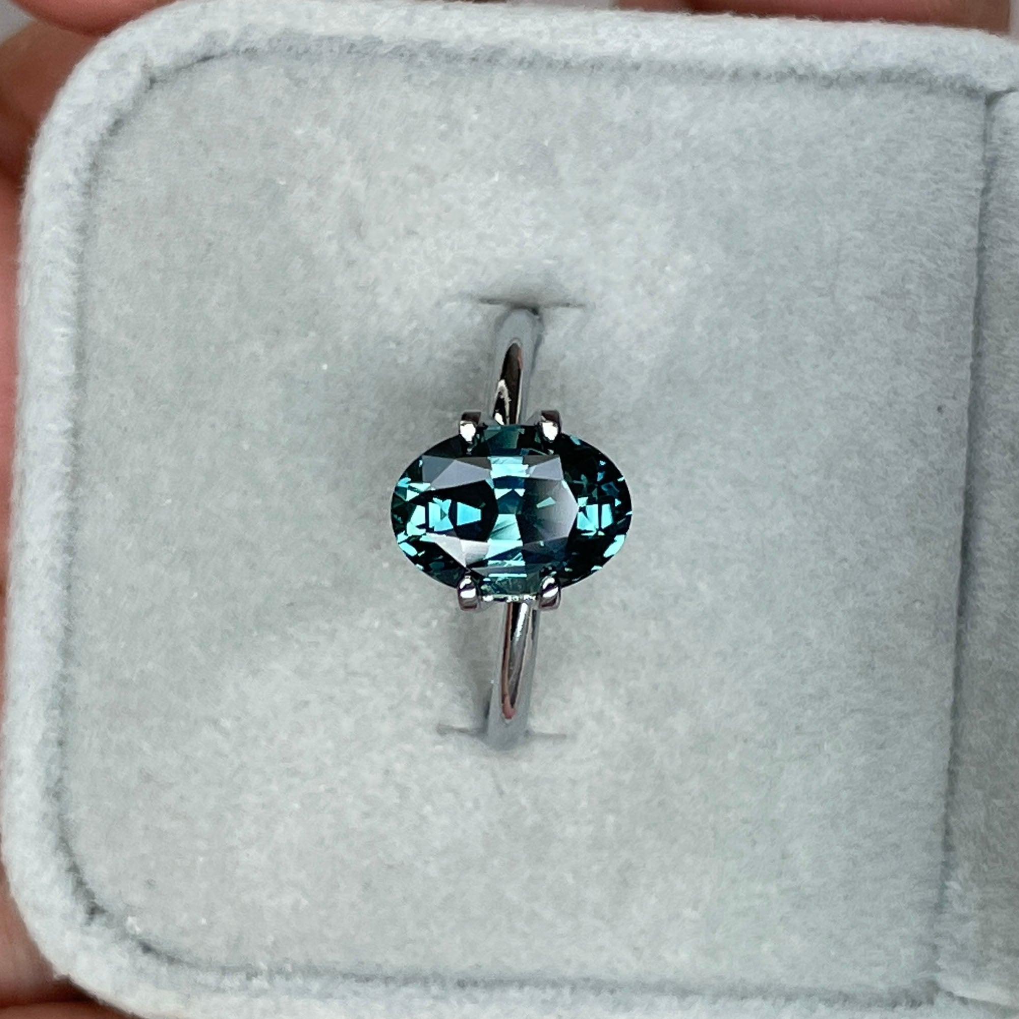 teal blue green parti sapphire oval cut gem