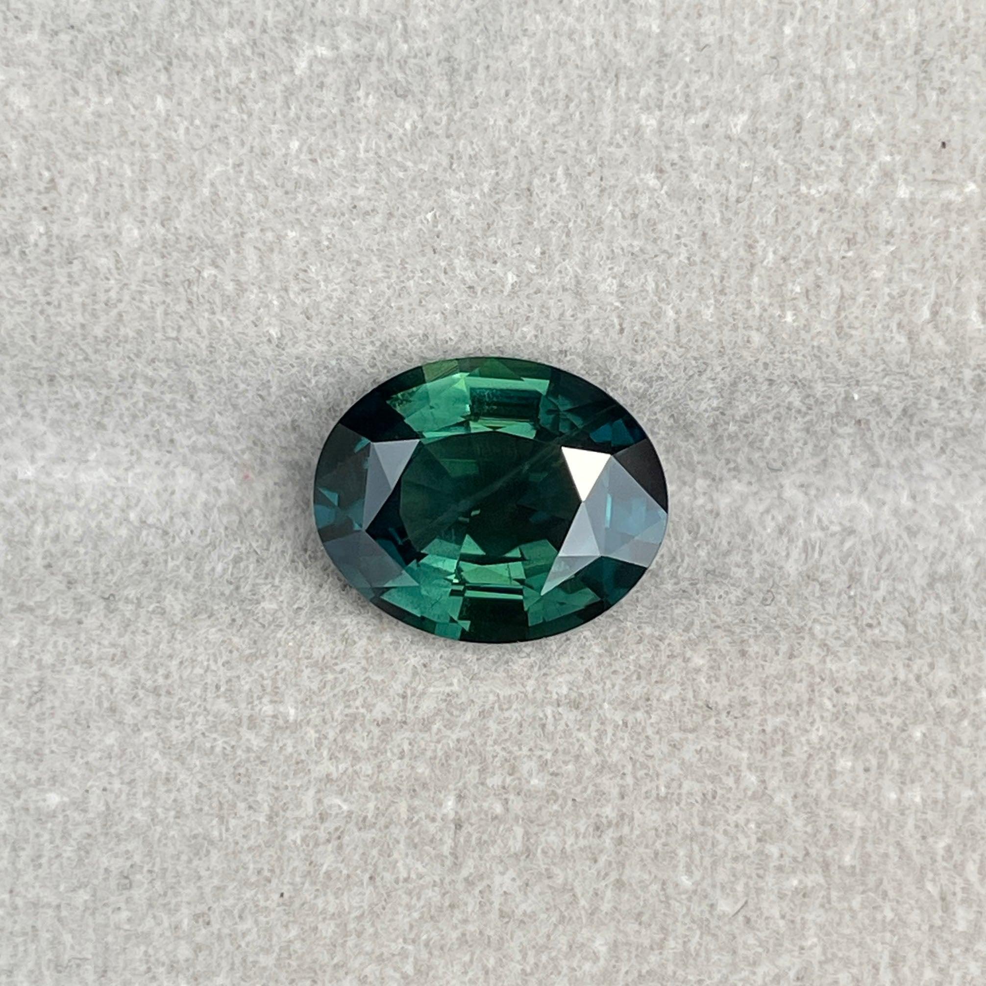 teal blue green parti sapphire oval cut gem