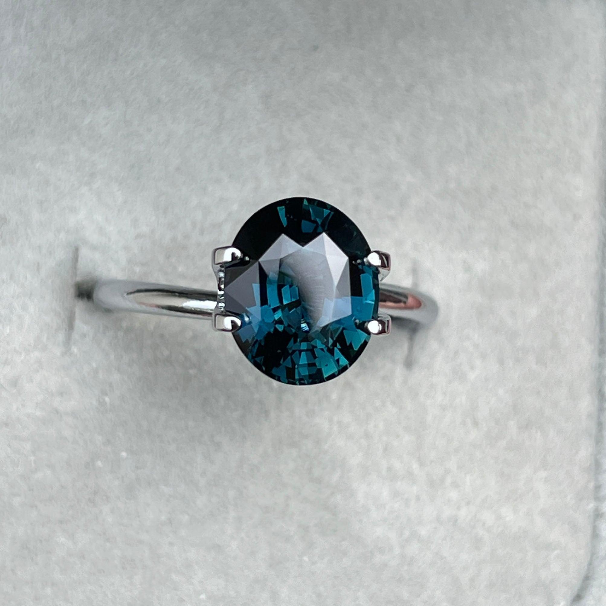 teal blue green parti sapphire oval cut gem