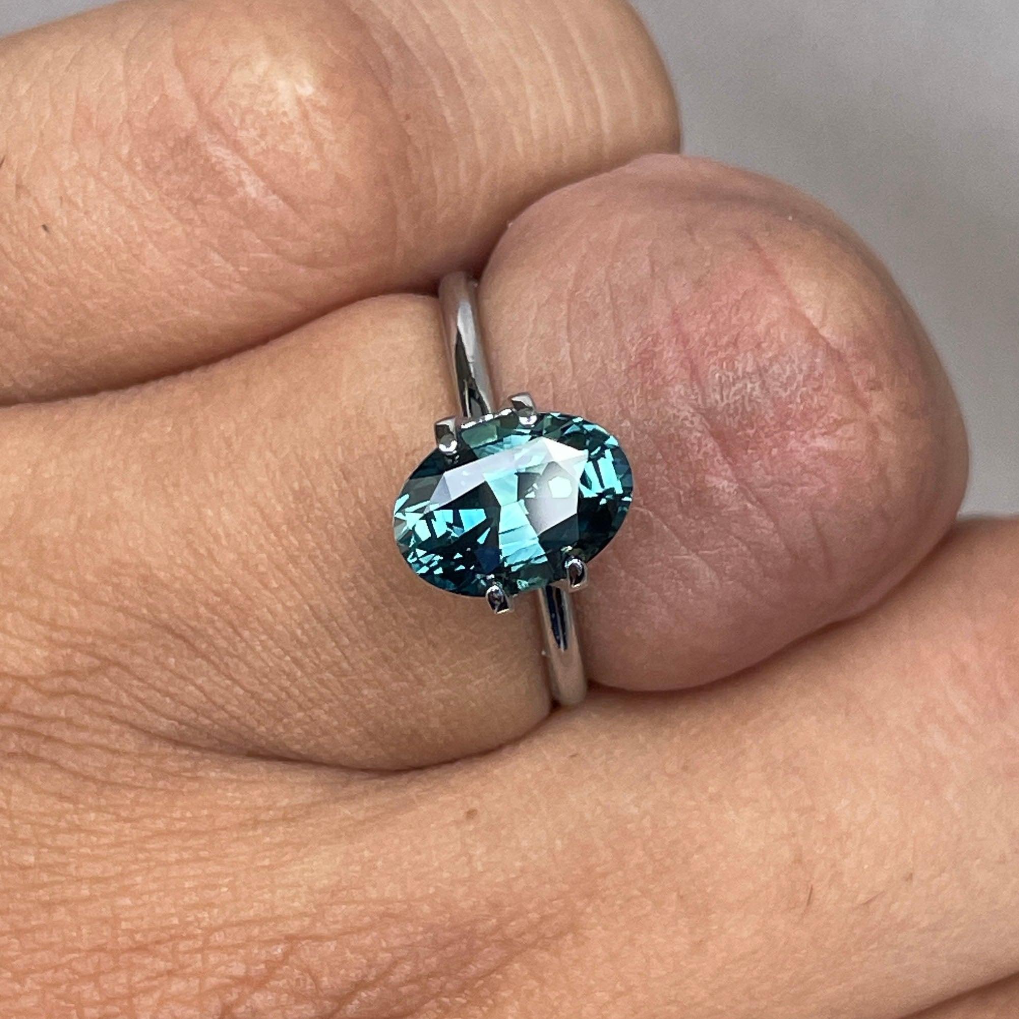 teal blue green parti sapphire oval cut gem