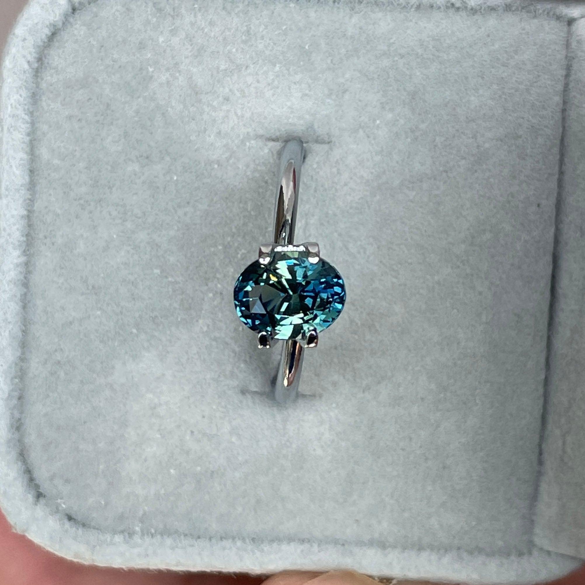 teal blue green parti sapphire oval cut gem