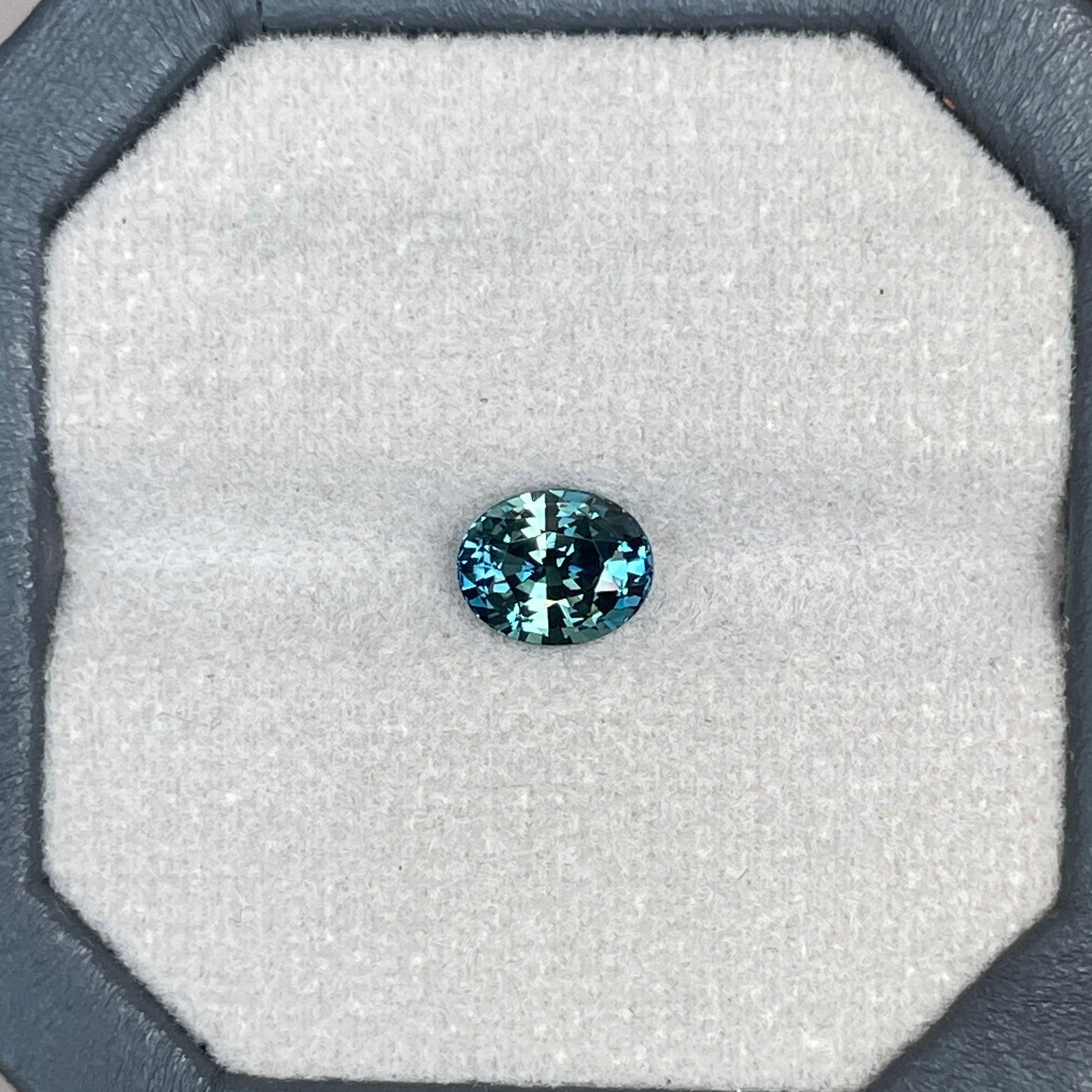 teal blue green parti sapphire oval cut gem