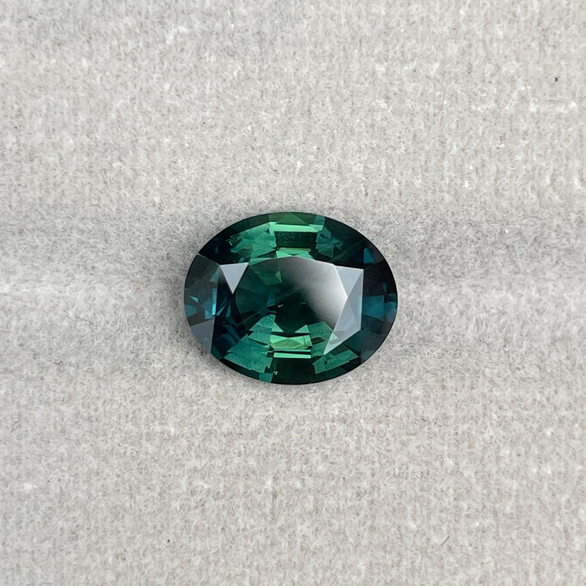 teal blue green parti sapphire oval cut gem
