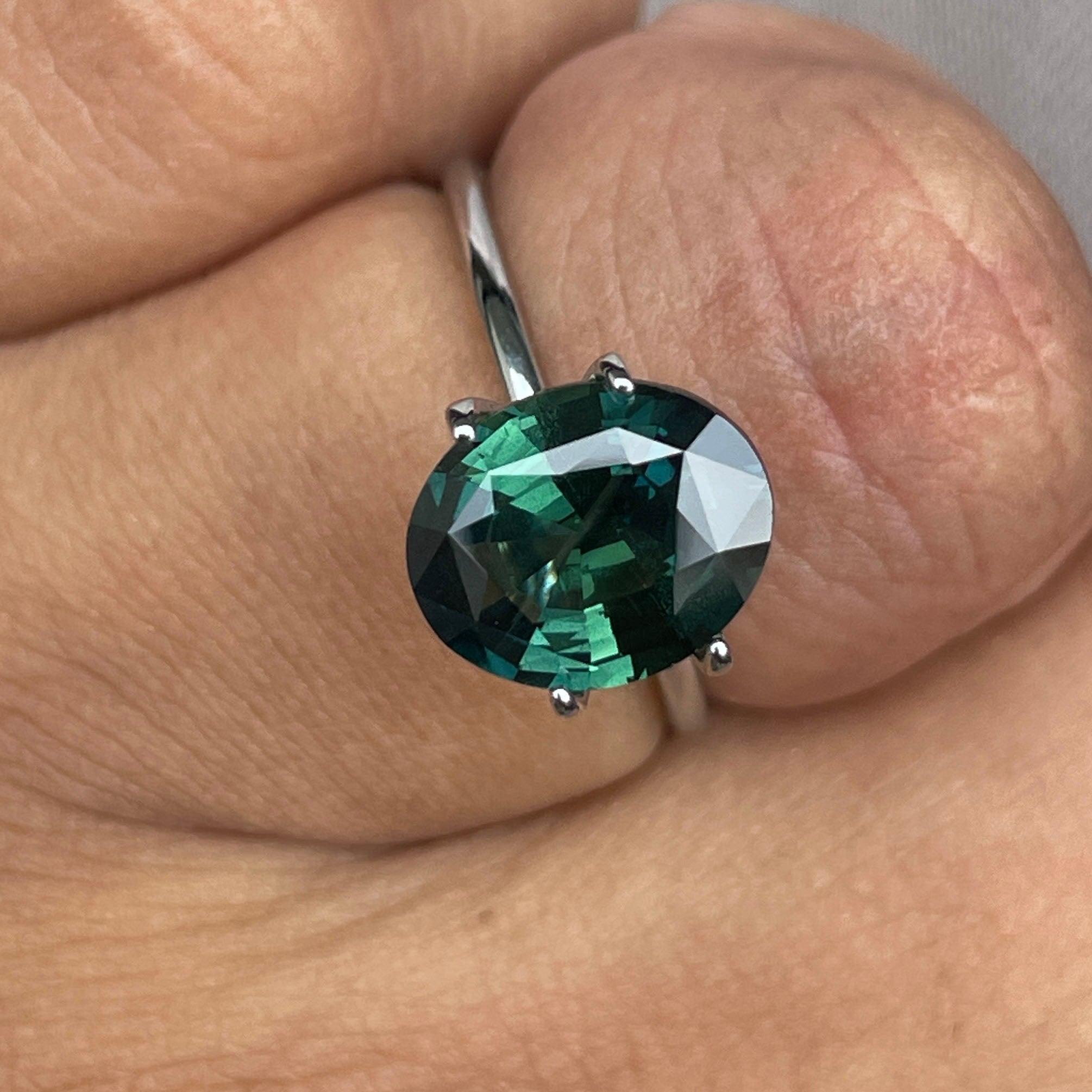 teal blue green parti sapphire oval cut gem