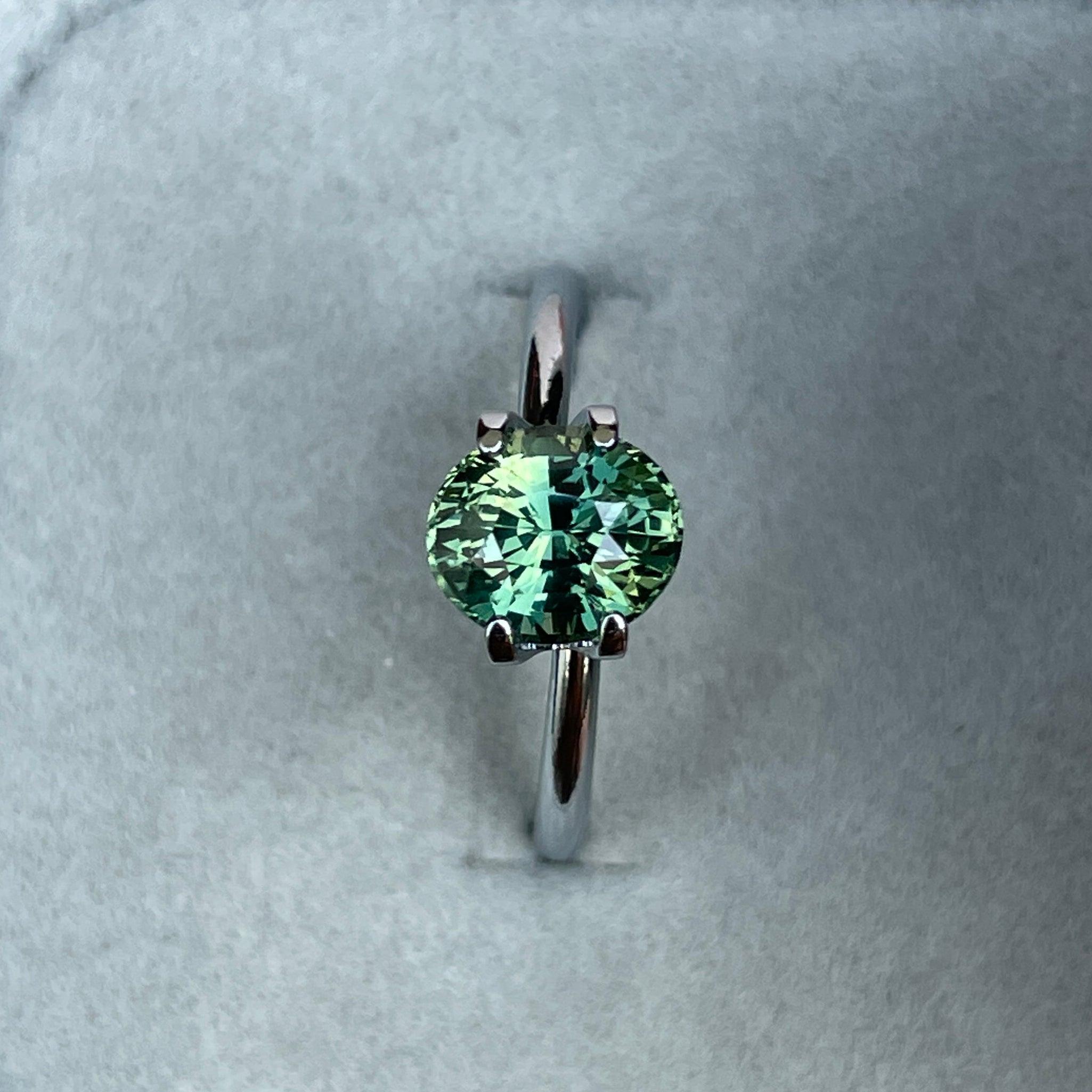 teal blue green parti sapphire oval cut gem