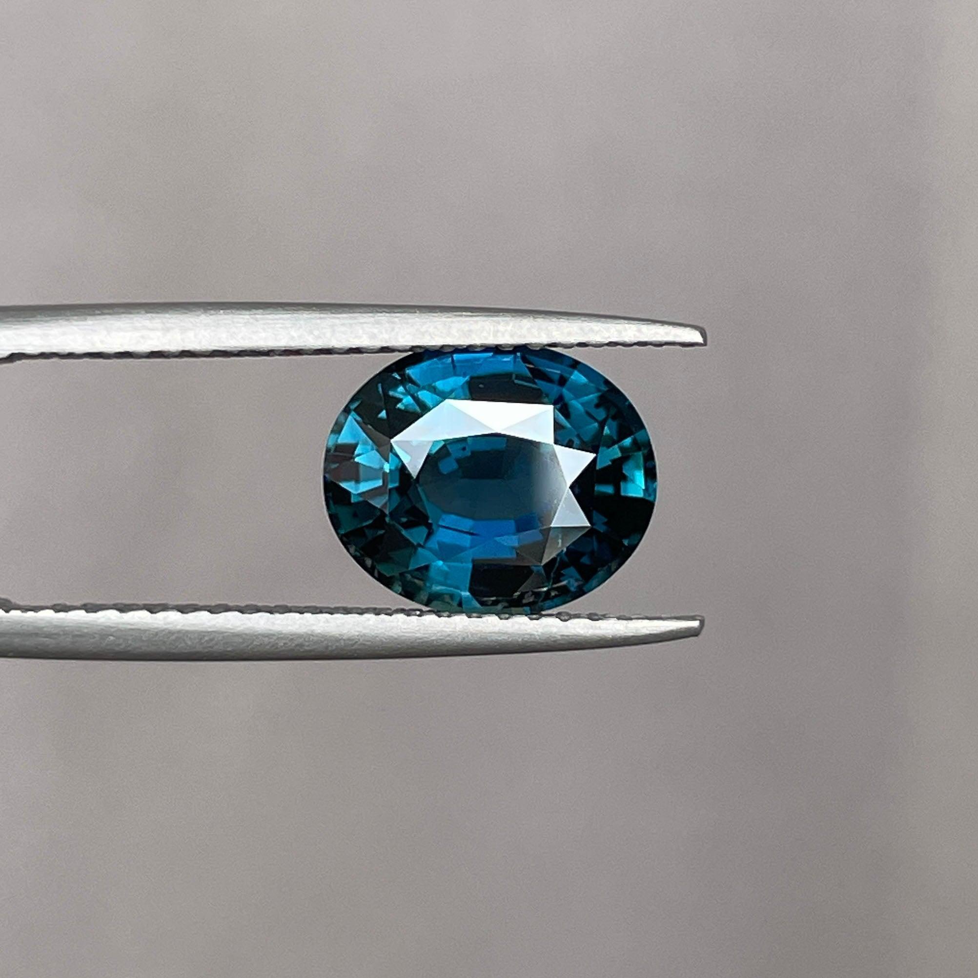 teal blue green parti sapphire oval cut gem