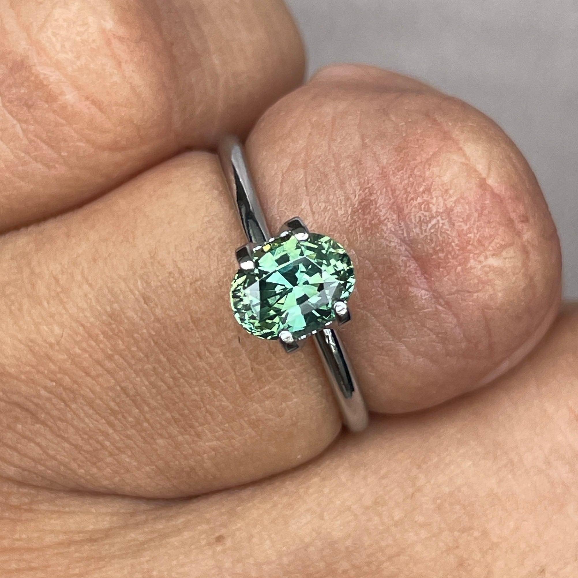 teal blue green parti sapphire oval cut gem