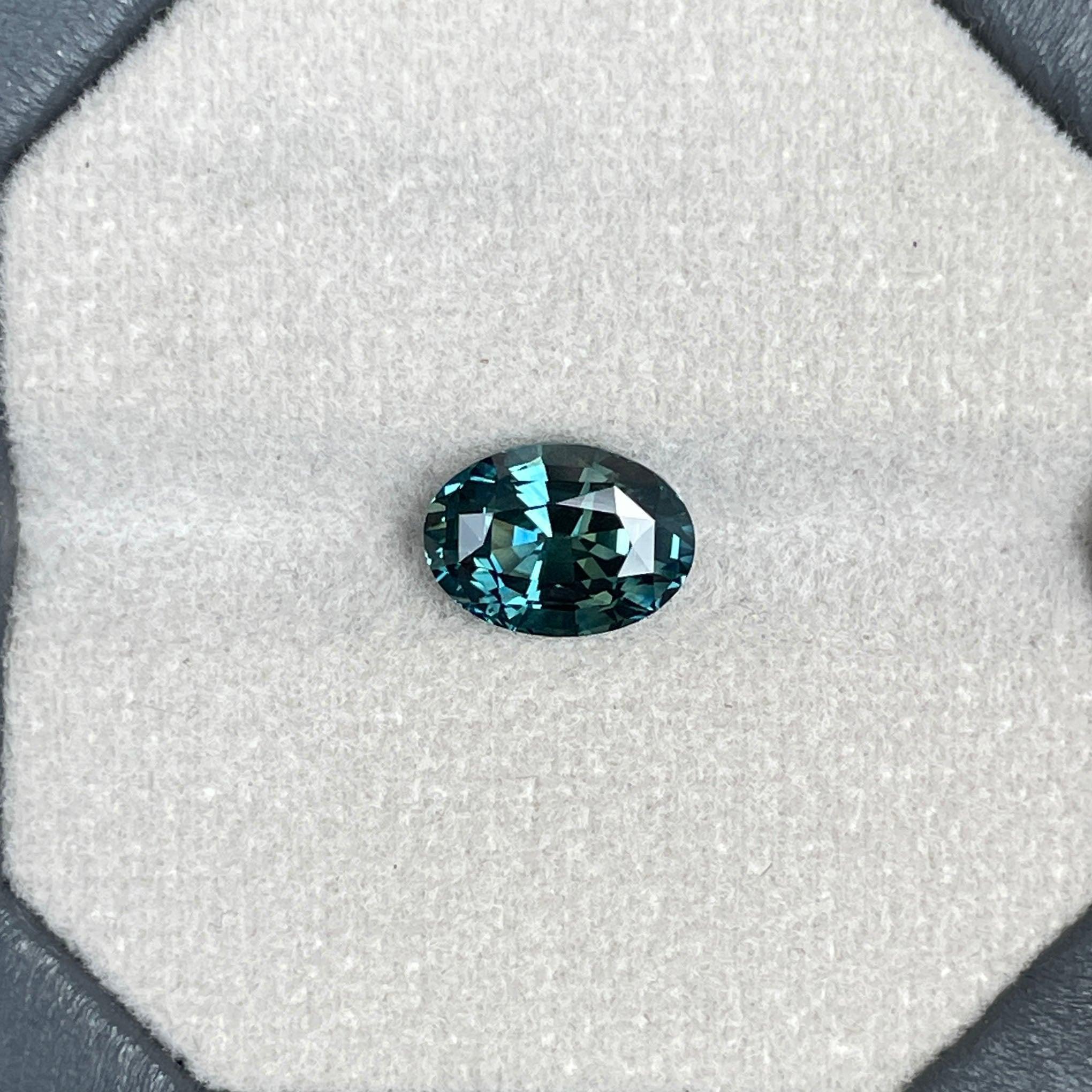 teal blue green parti sapphire oval cut gem