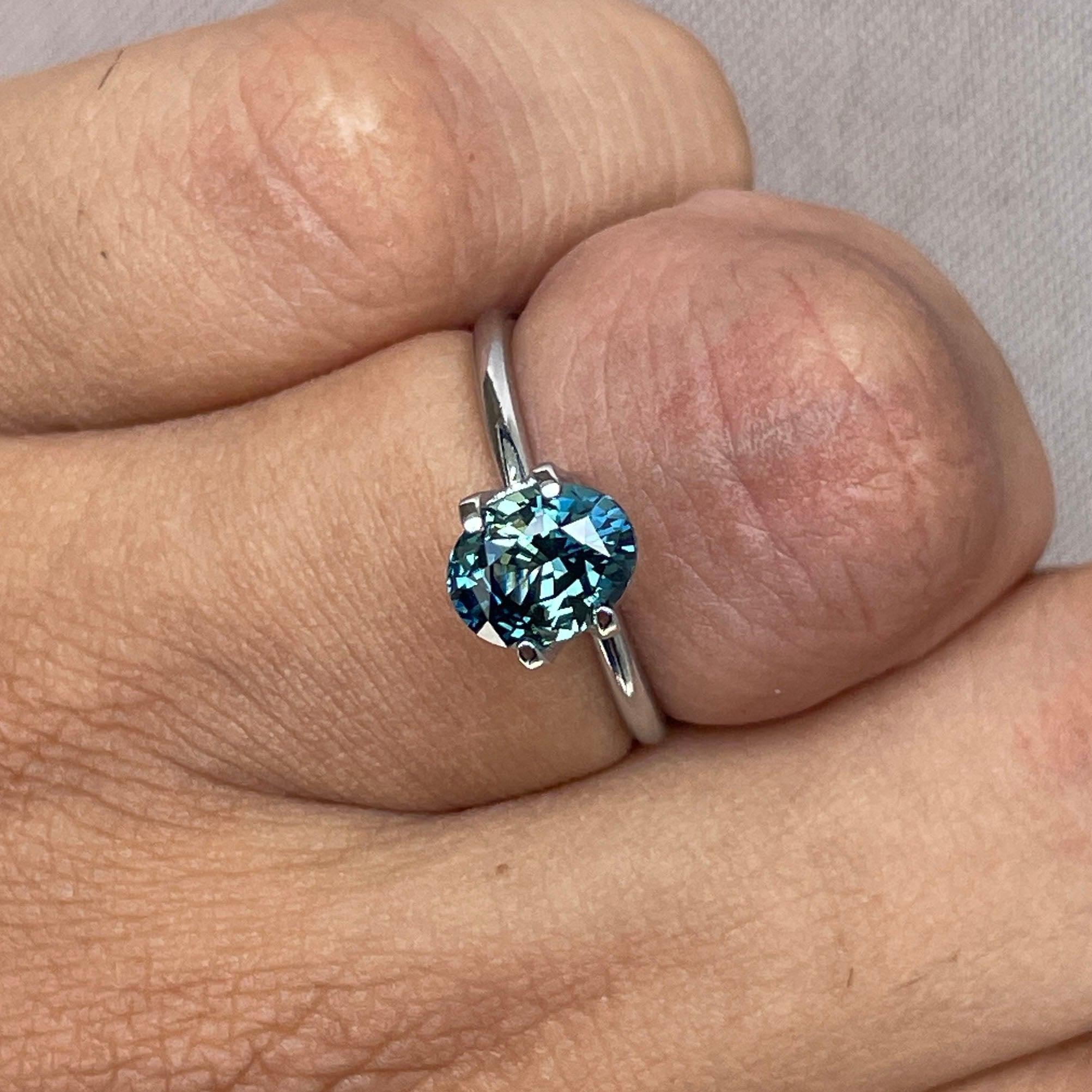 teal blue green parti sapphire oval cut gem