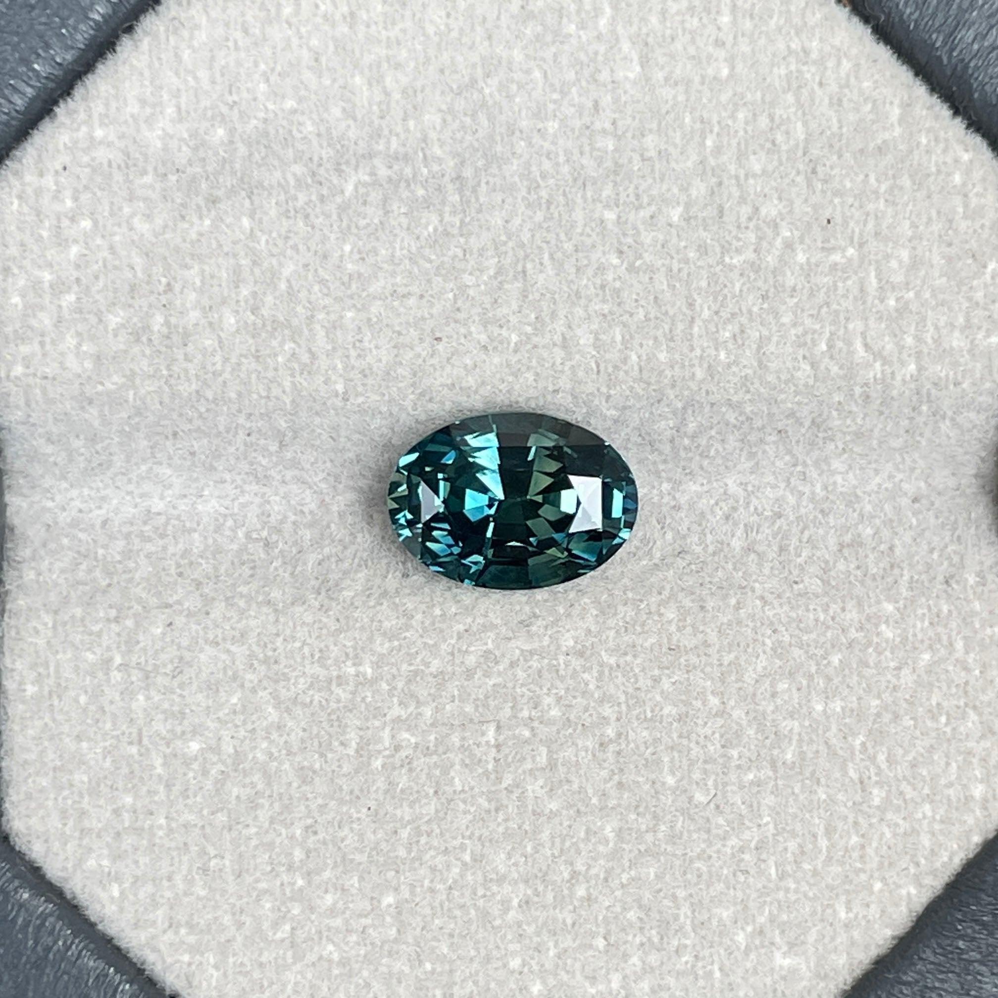 teal blue green parti sapphire oval cut gem