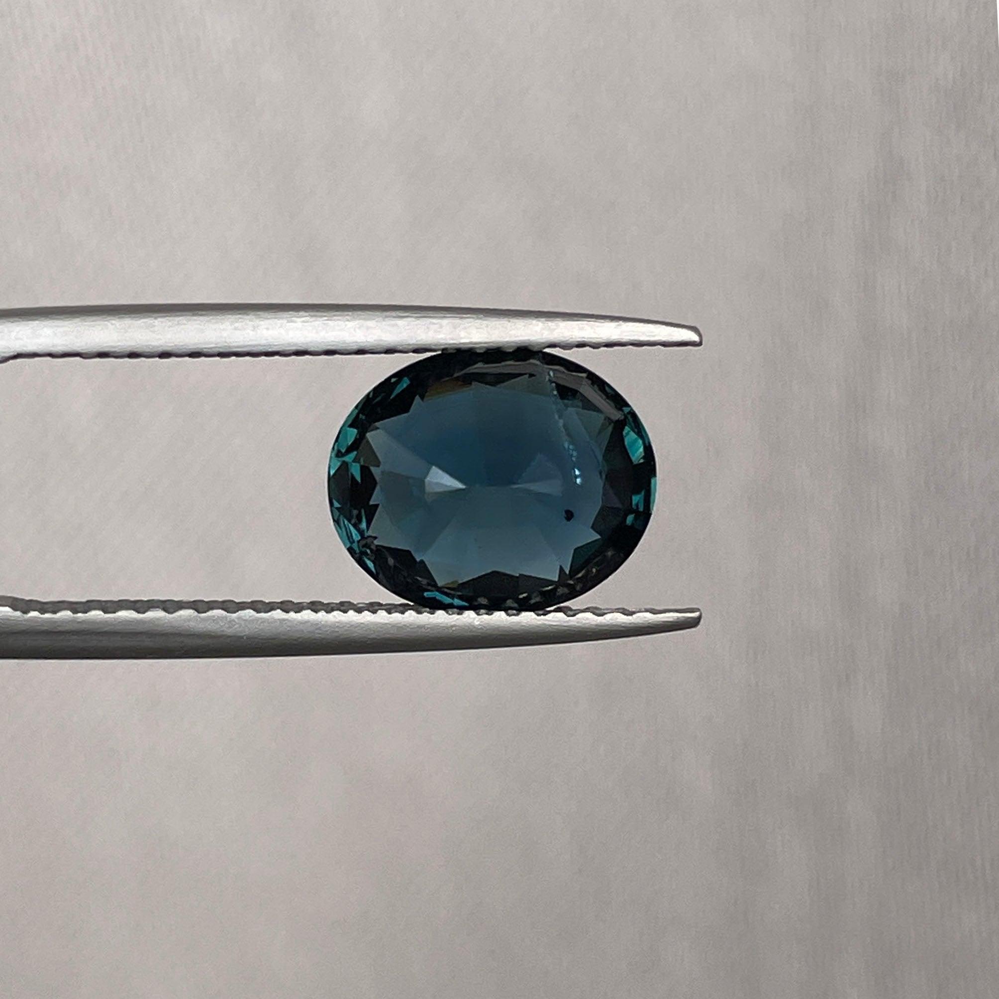 teal blue green parti sapphire oval cut gem