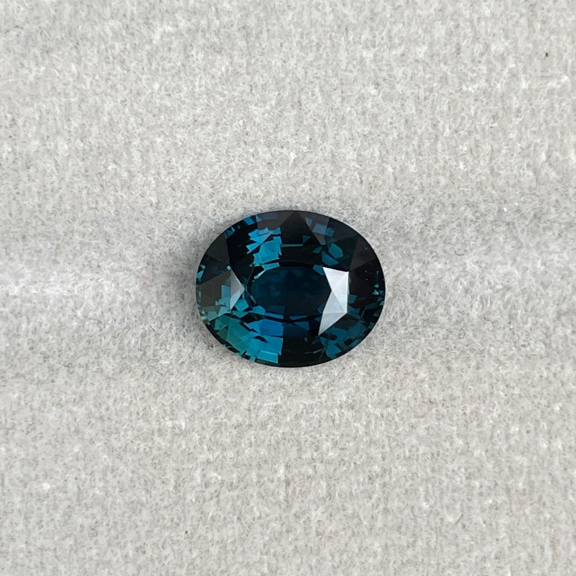teal blue green parti sapphire oval cut gem