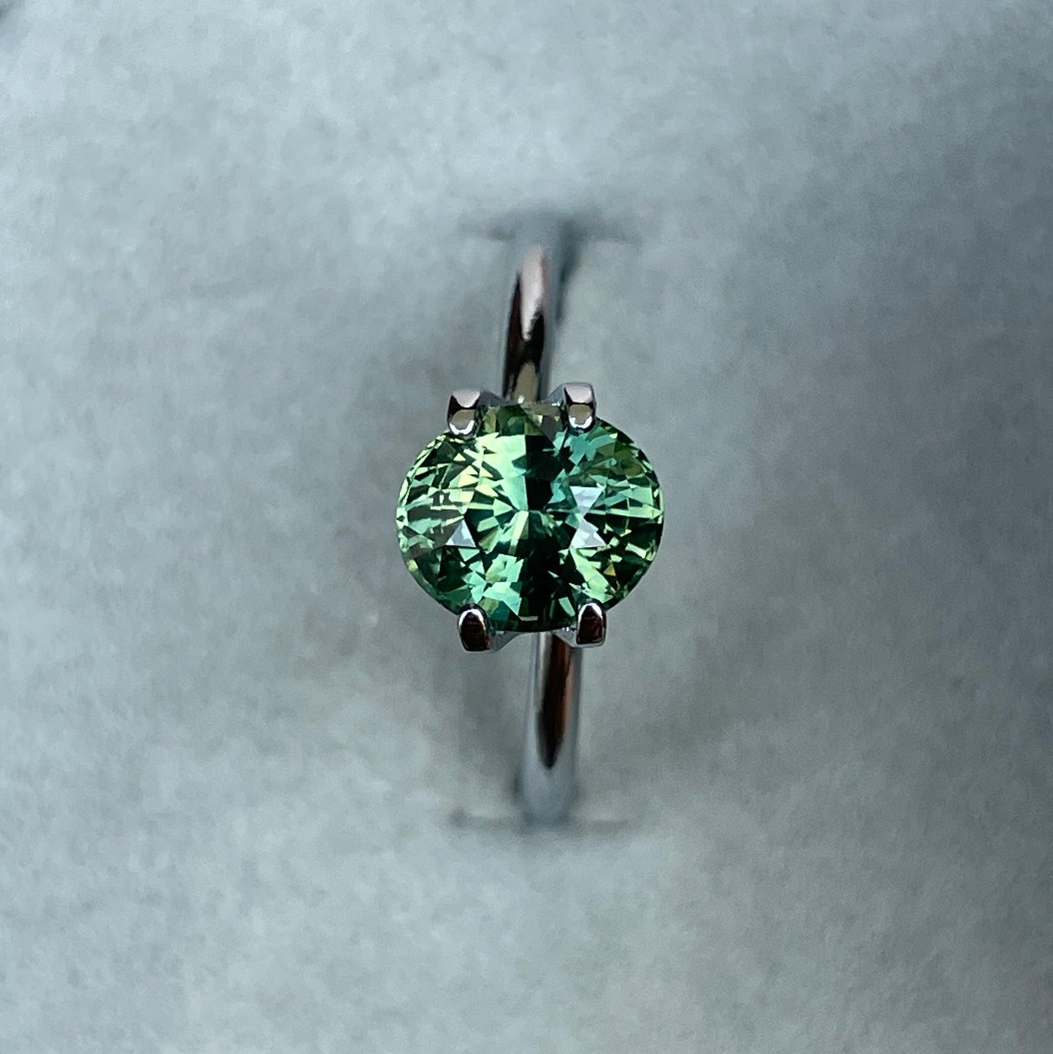 teal blue green parti sapphire oval cut gem