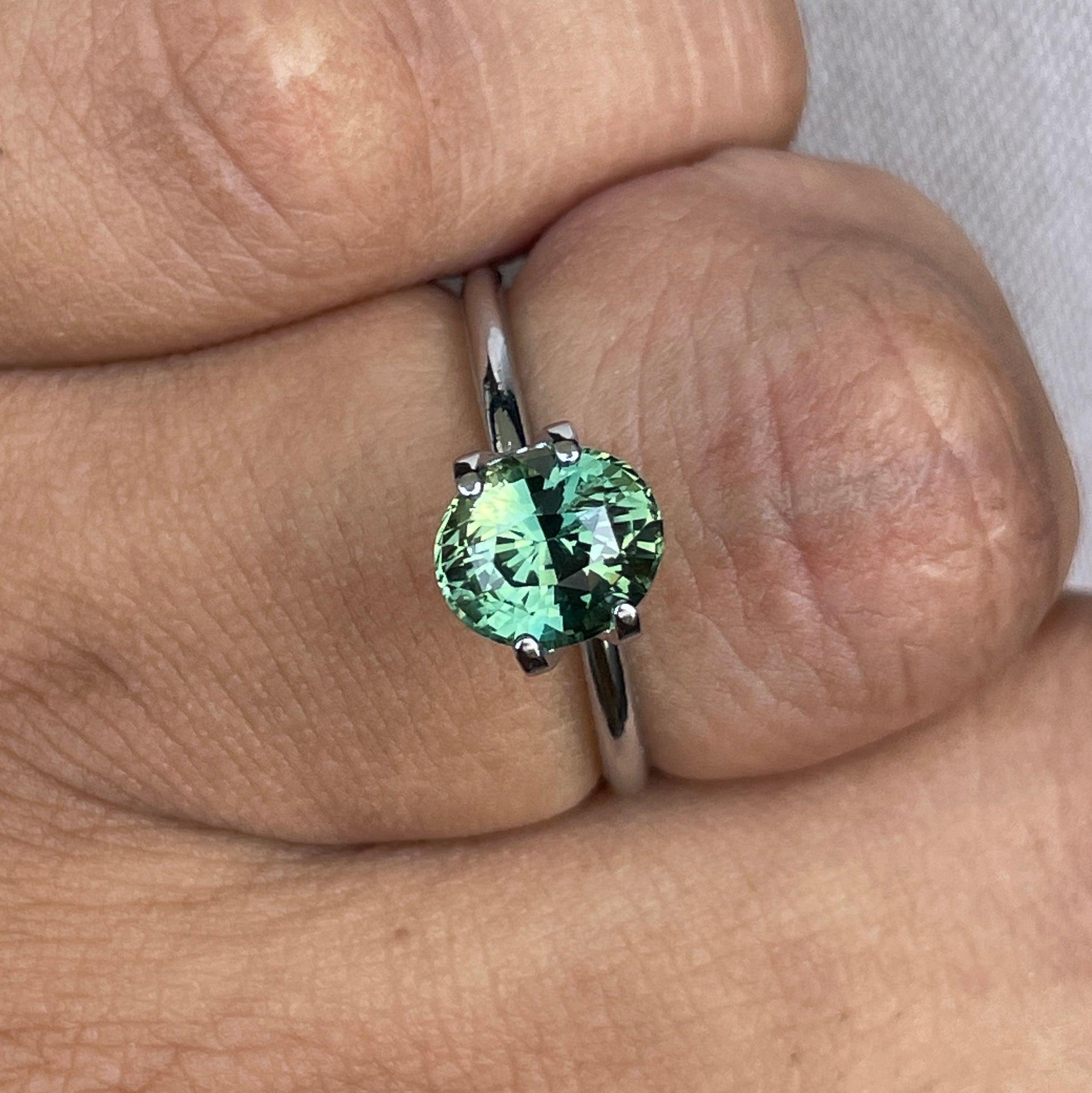 teal blue green parti sapphire oval cut gem