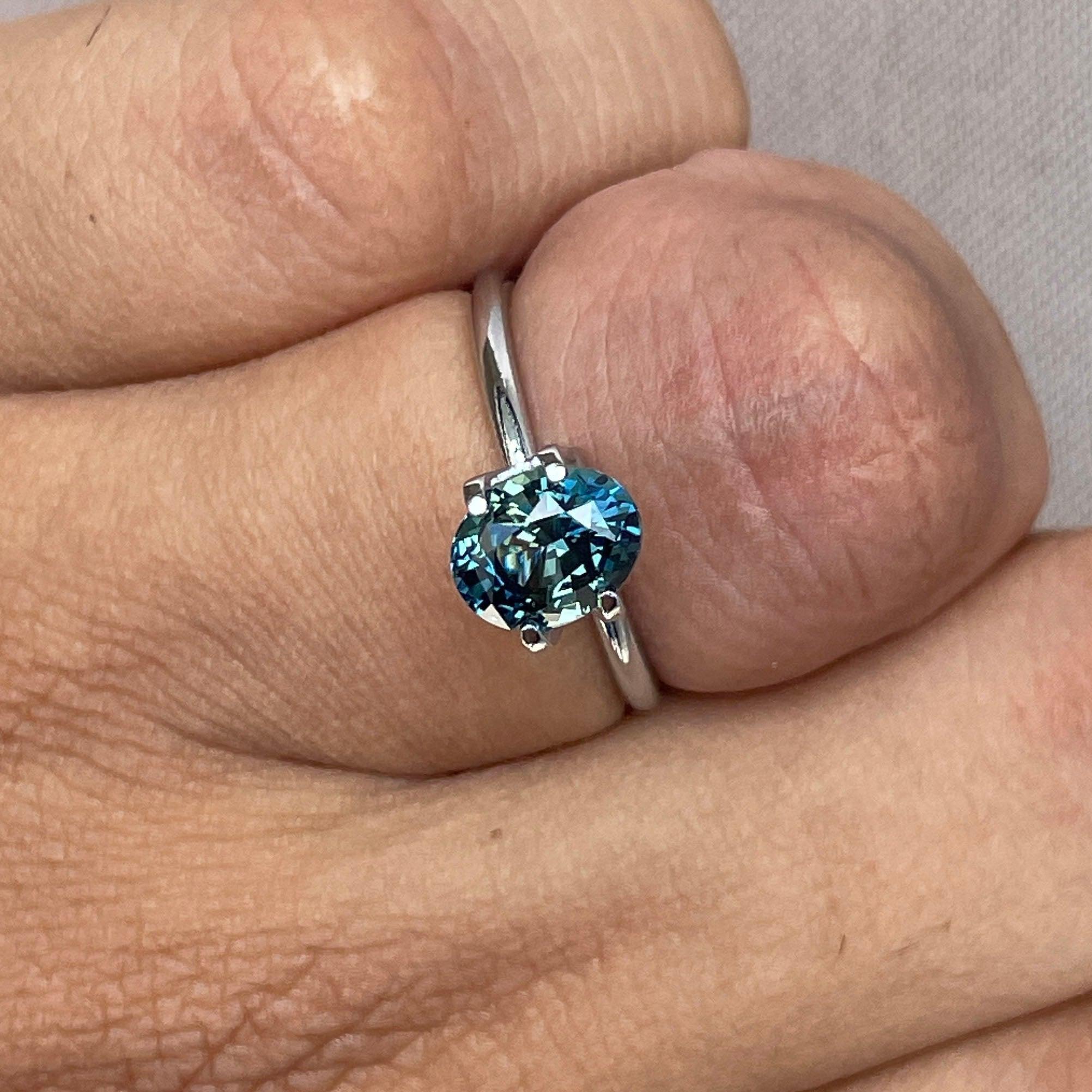 teal blue green parti sapphire oval cut gem