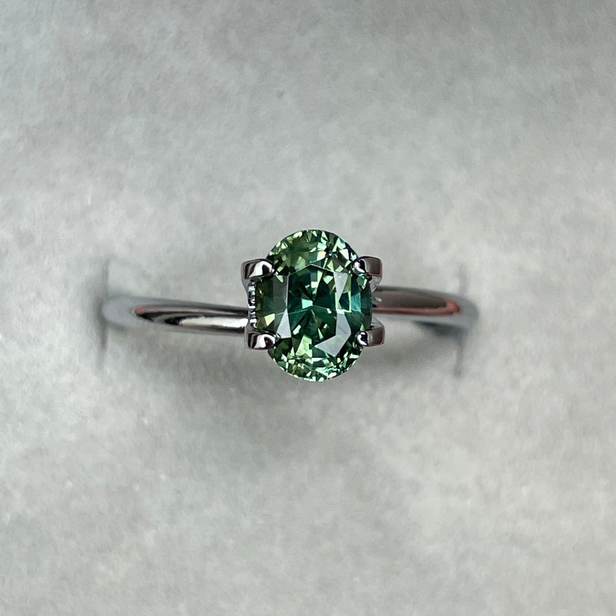 teal blue green parti sapphire oval cut gem