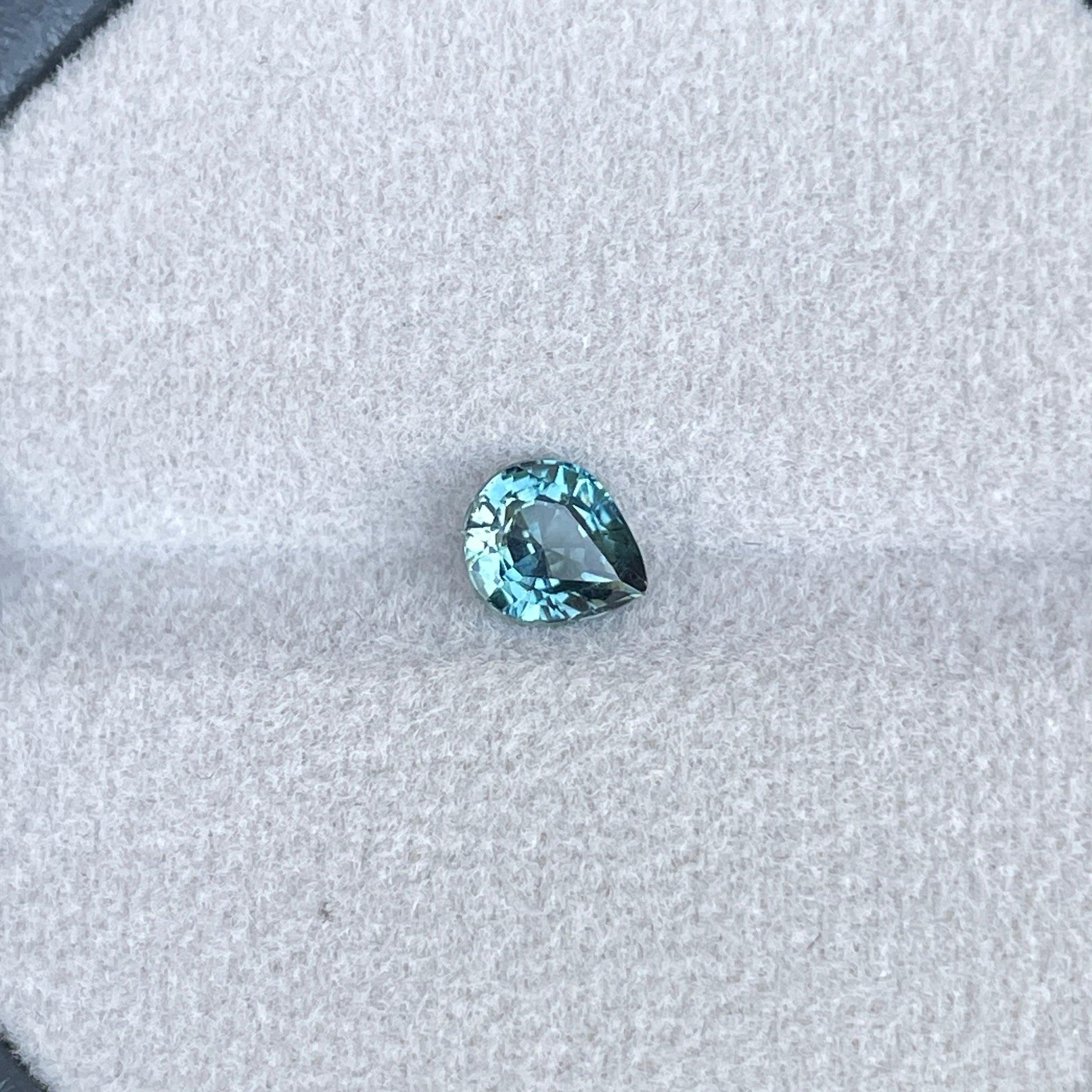 teal blue green parti sapphire pear drop cut gem