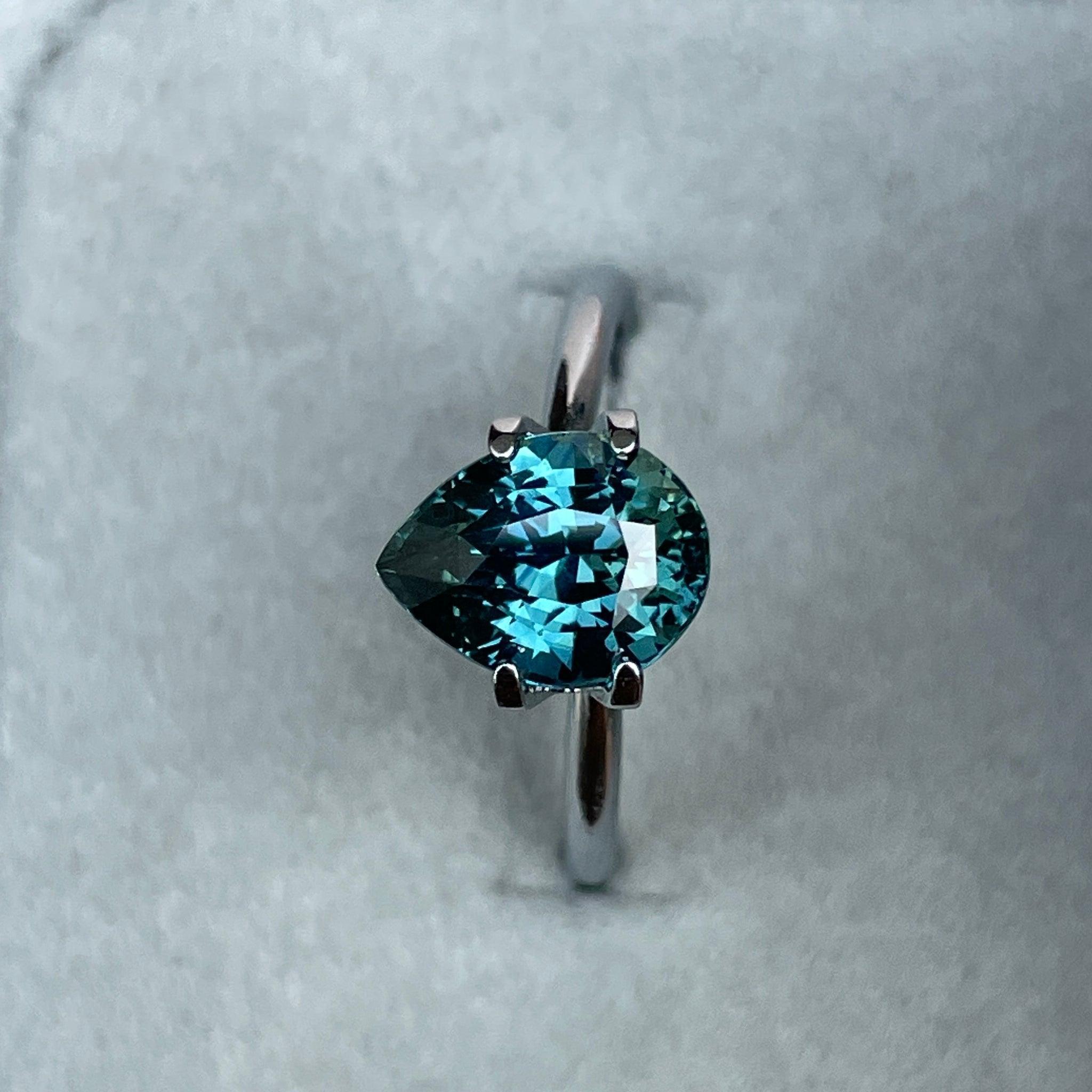 teal blue green parti sapphire pear drop cut gem
