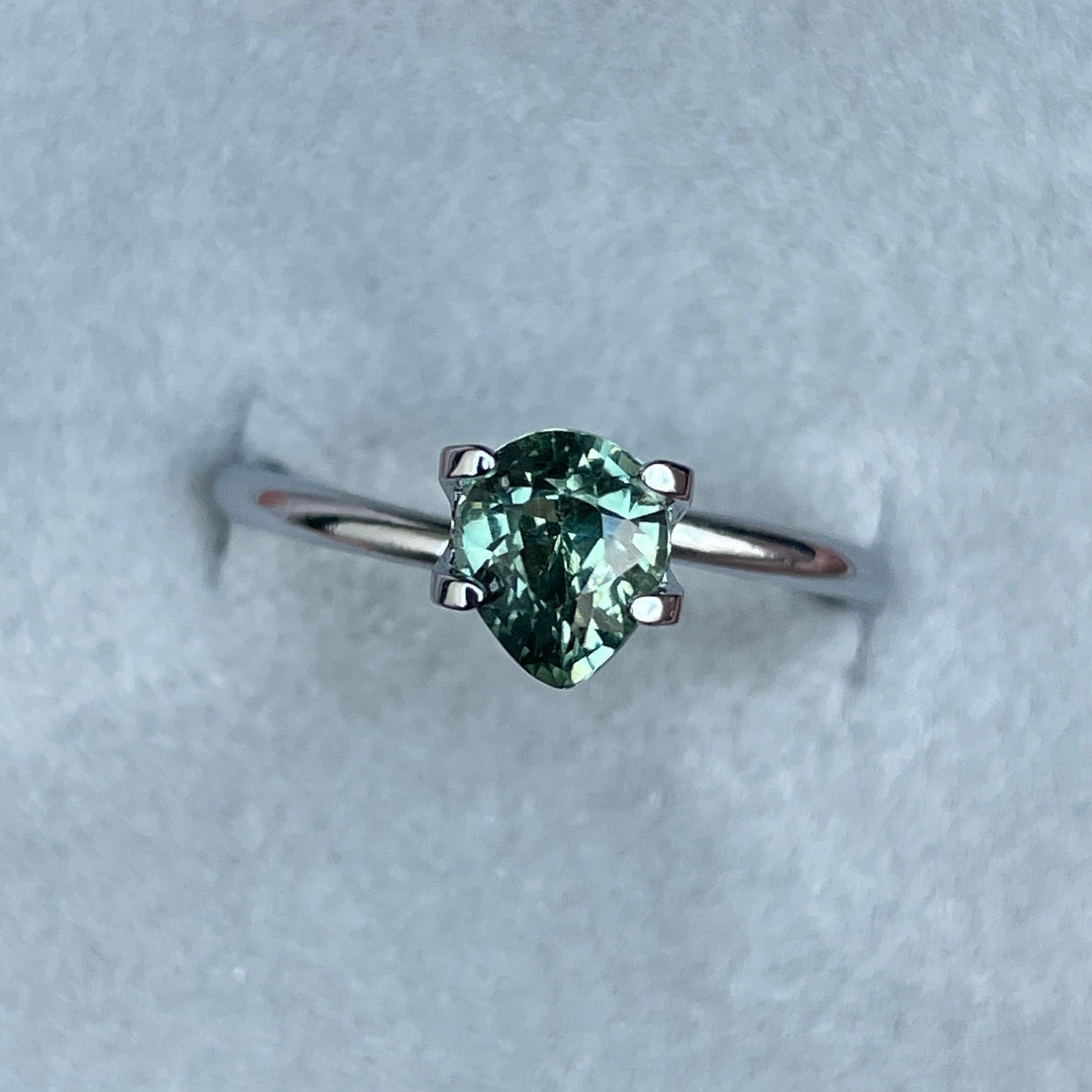 teal blue green parti sapphire pear drop cut gem