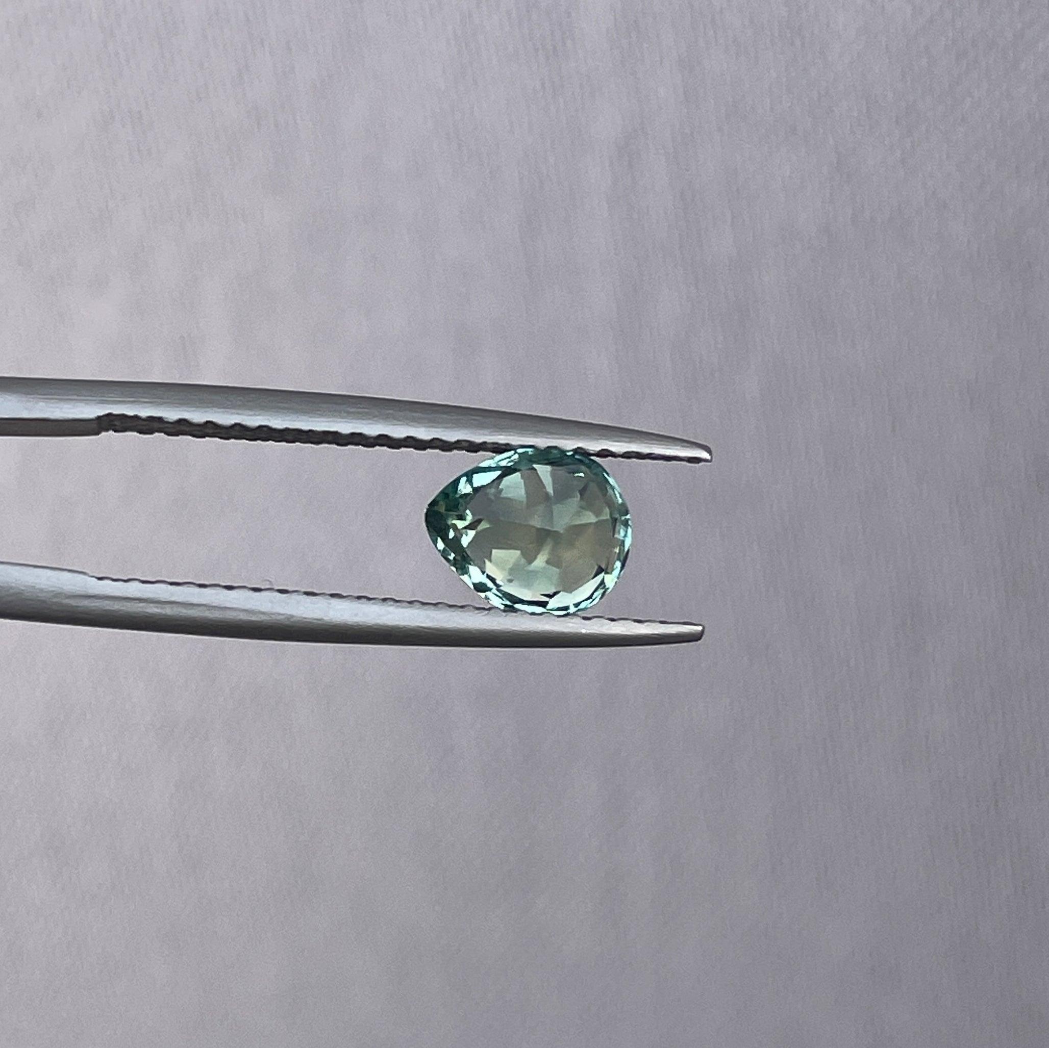 teal blue green parti sapphire pear drop cut gem
