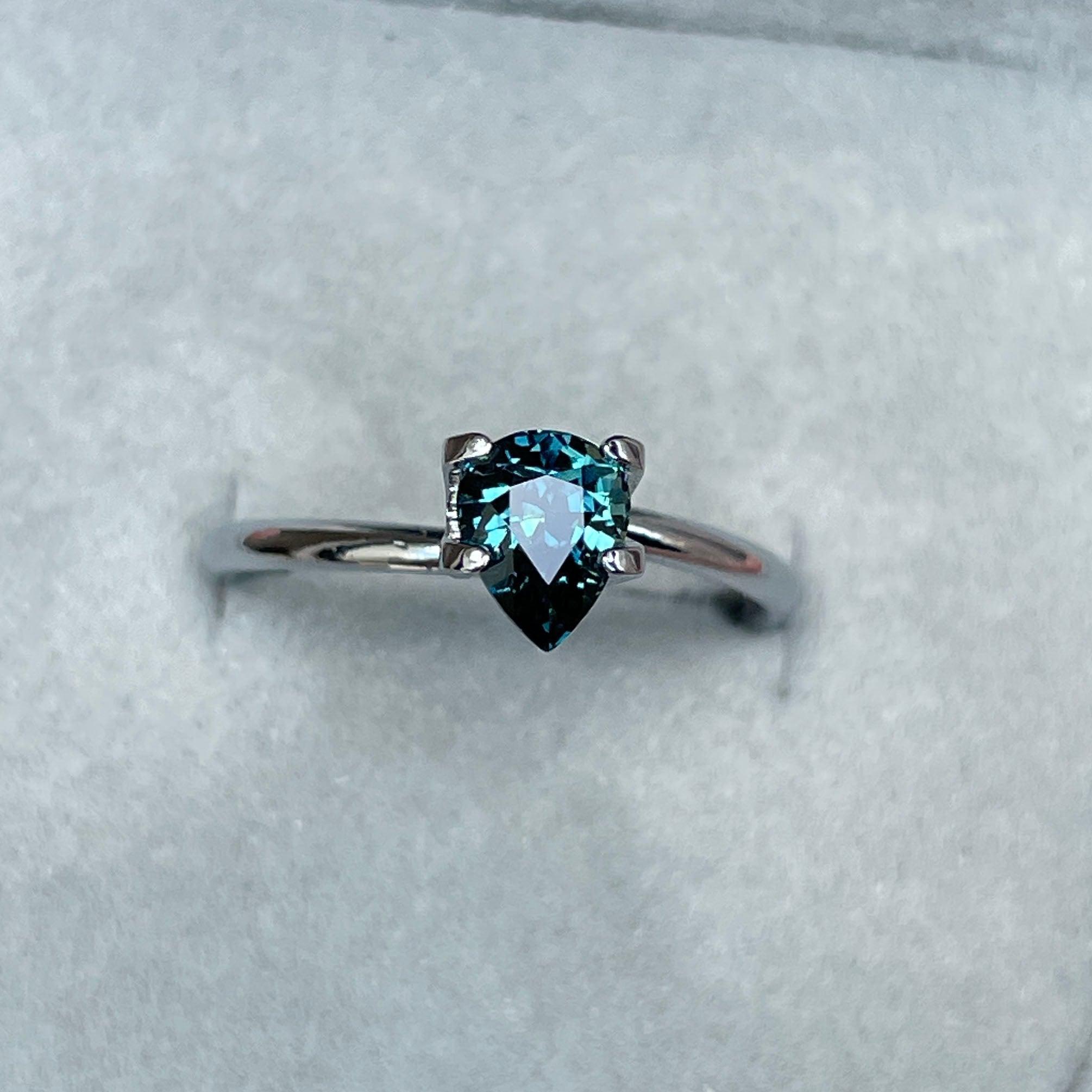 teal blue green parti sapphire pear drop cut gem