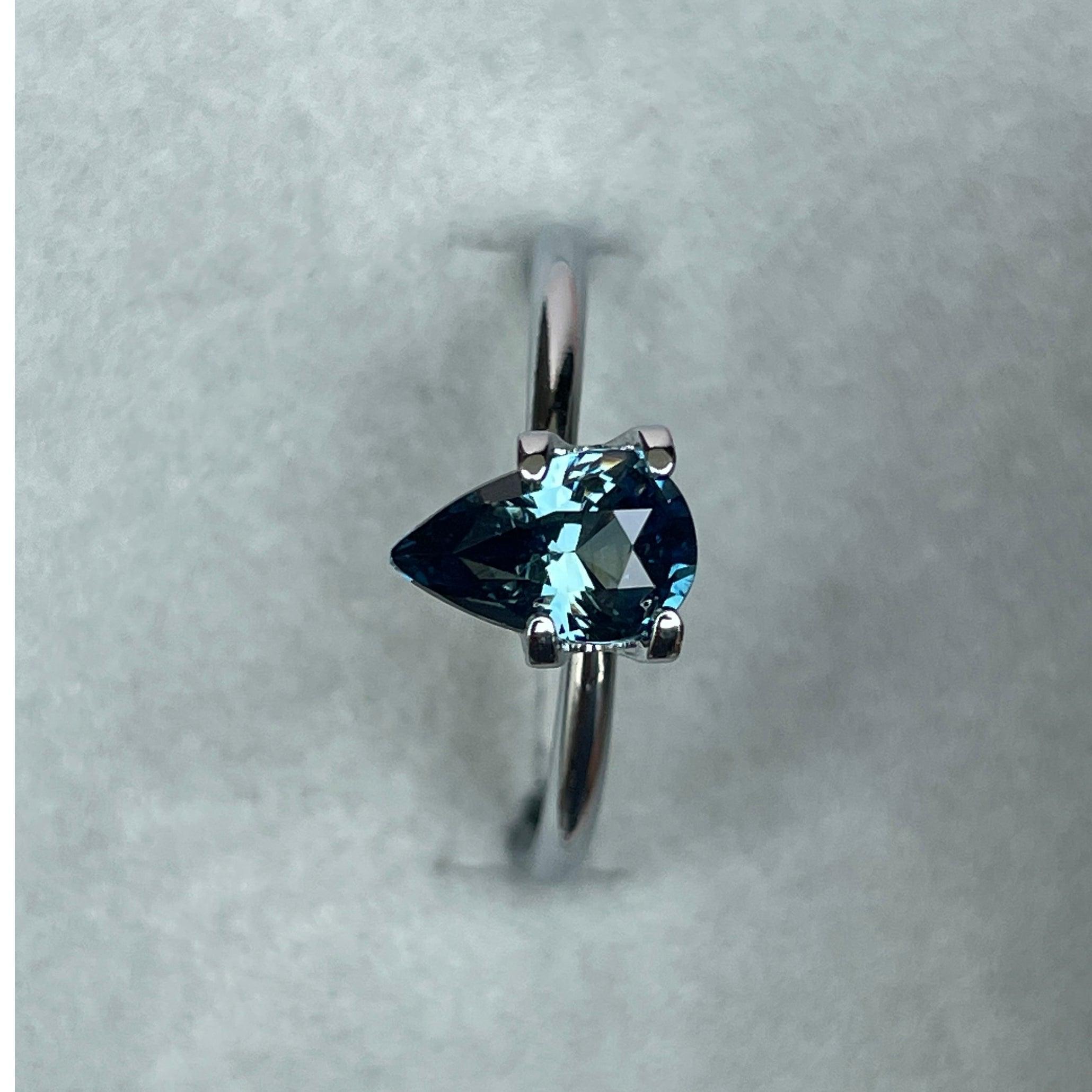 teal blue green parti sapphire pear drop cut gem