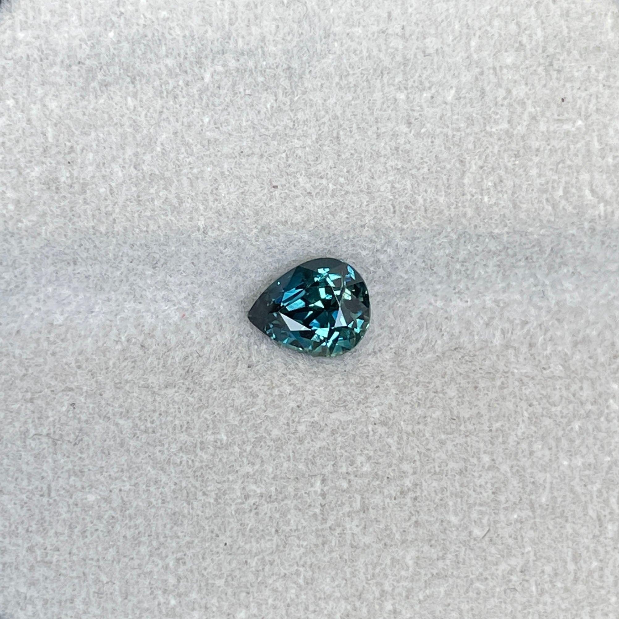teal blue green parti sapphire pear drop cut gem