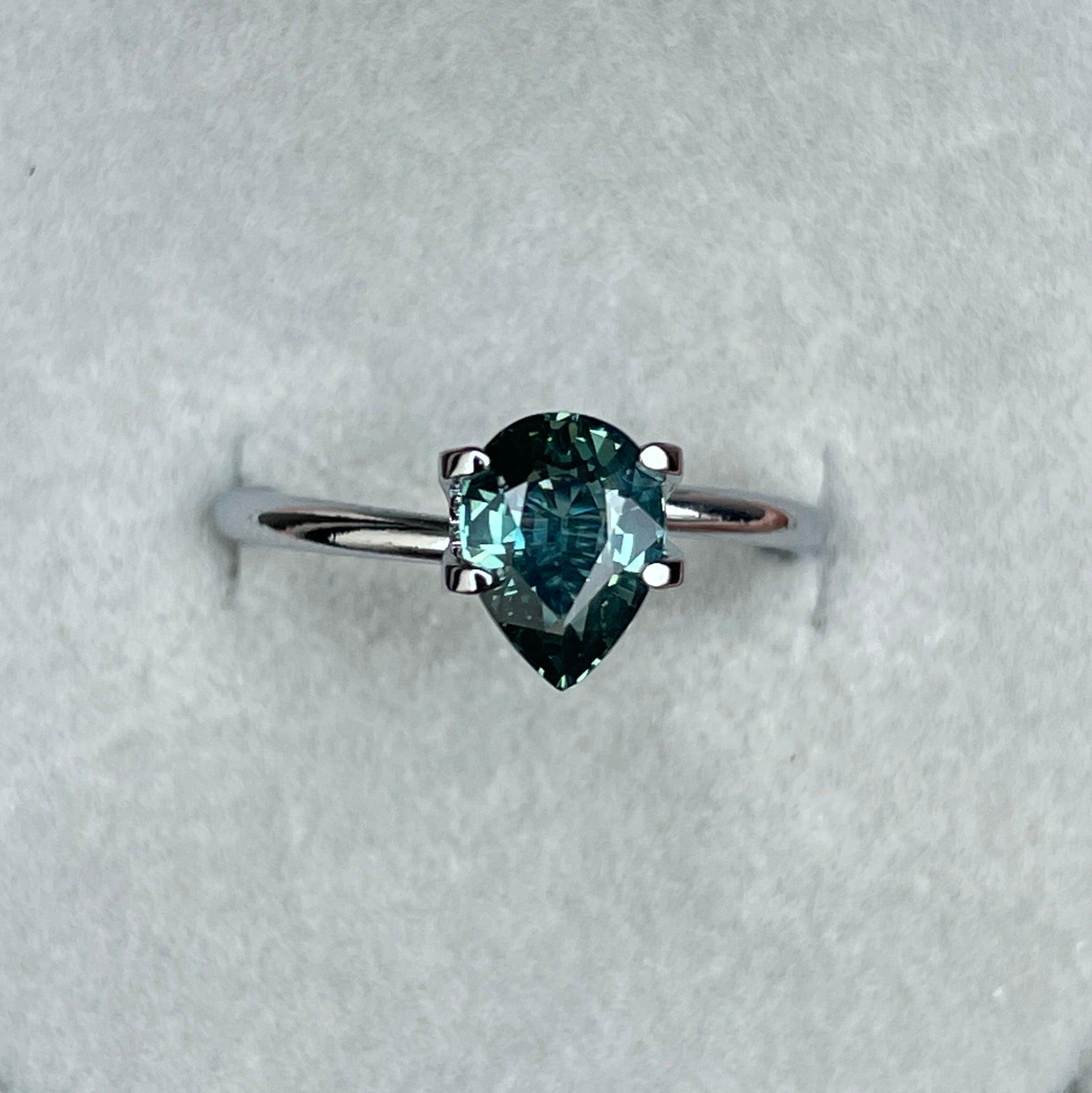 teal blue green parti sapphire pear drop cut gem